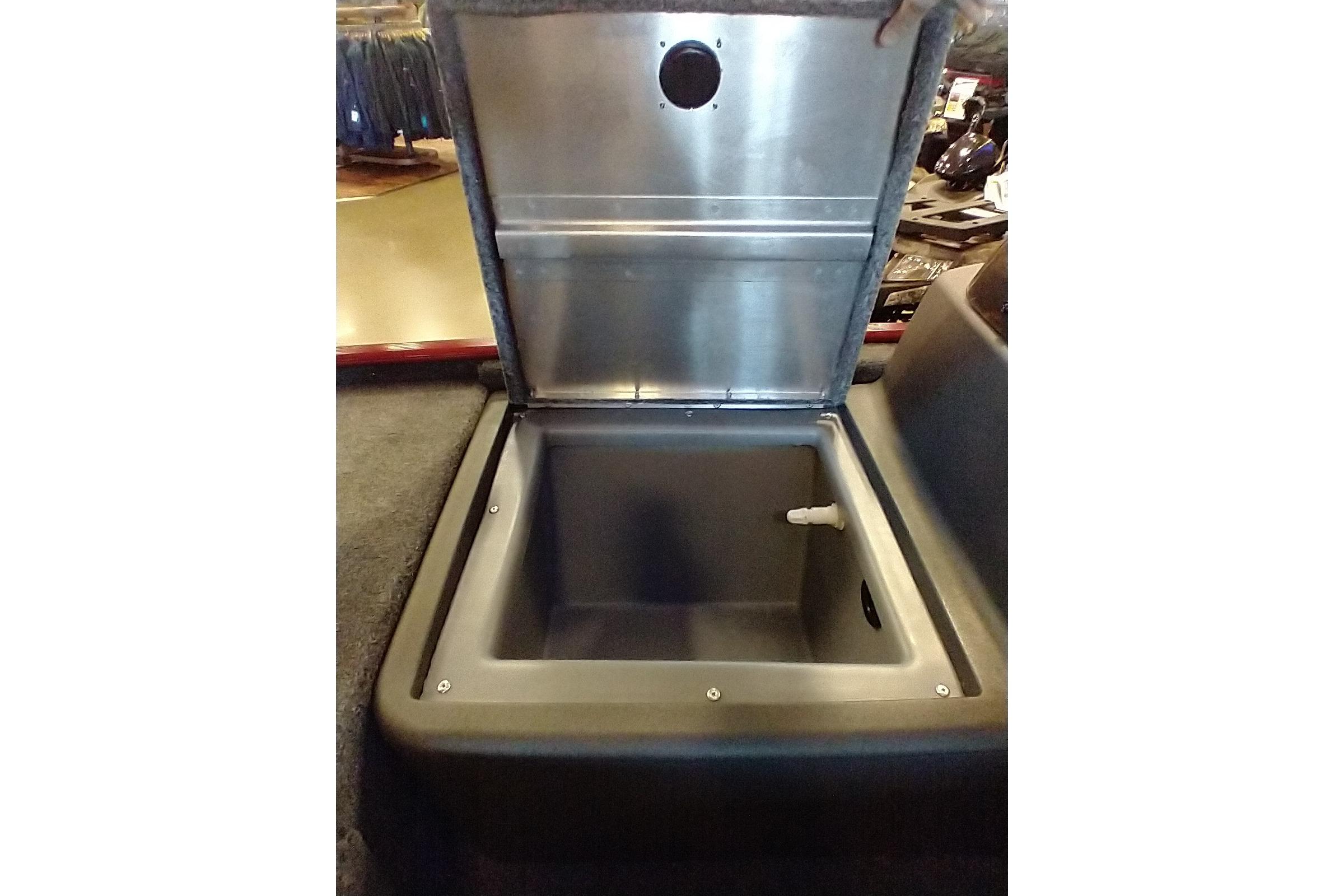 Open storage compartment in 2026 Tracker Bass Tracker Classic XL boat.