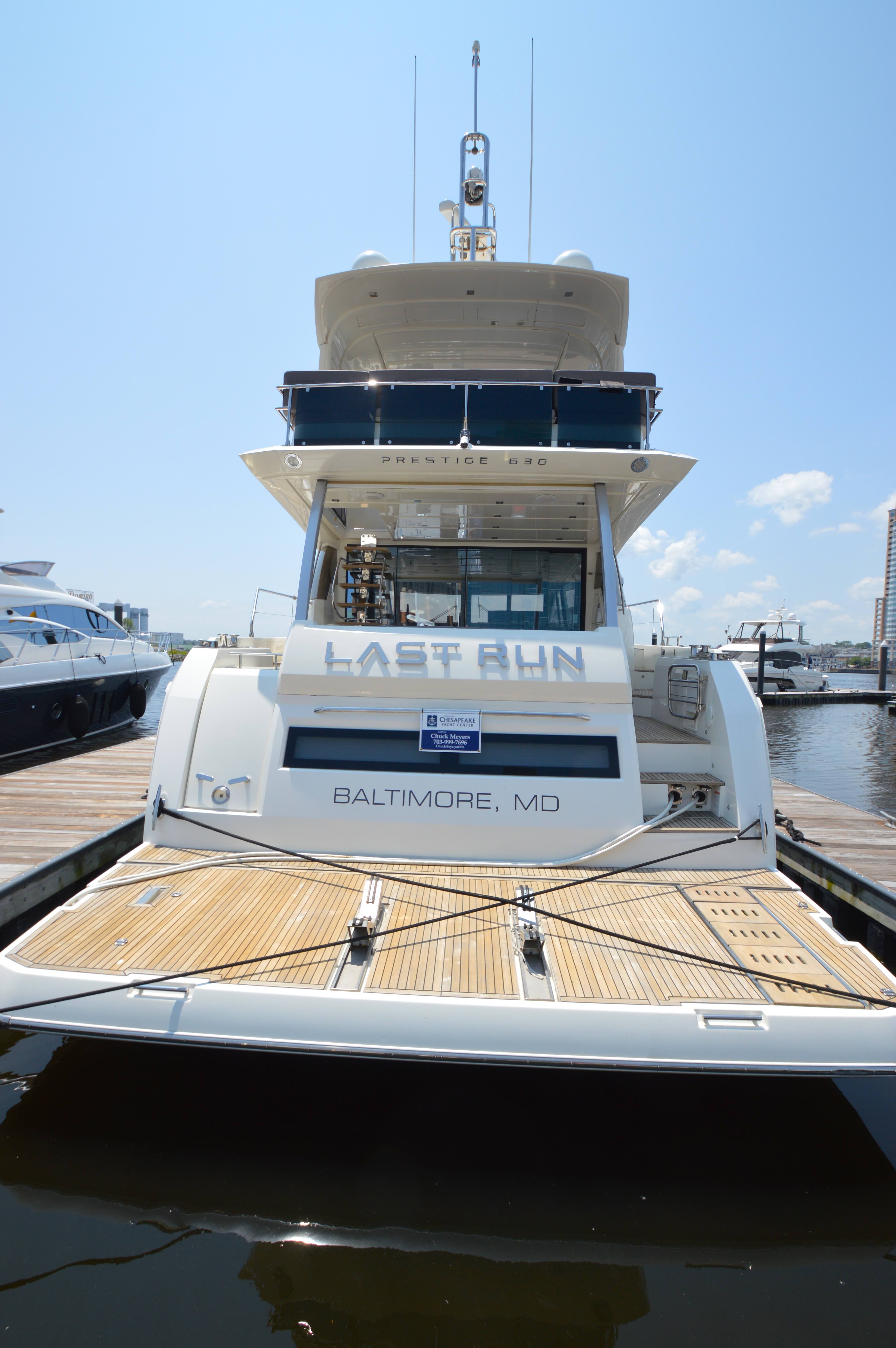 Rear view of a Prestige 630 yacht docked in Baltimore.