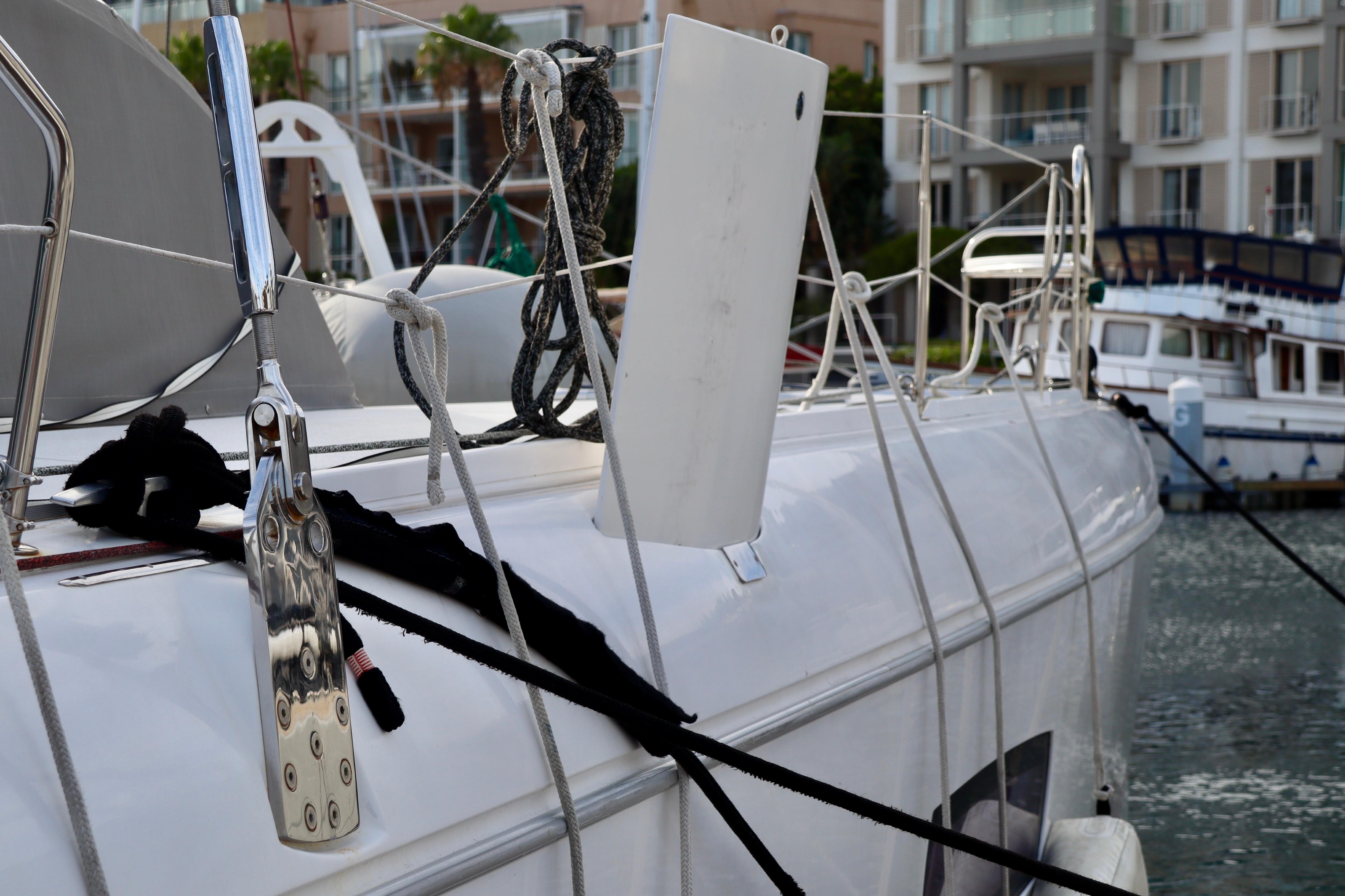 2017 Outremer 51 yacht docked, showcasing deck details and rigging.