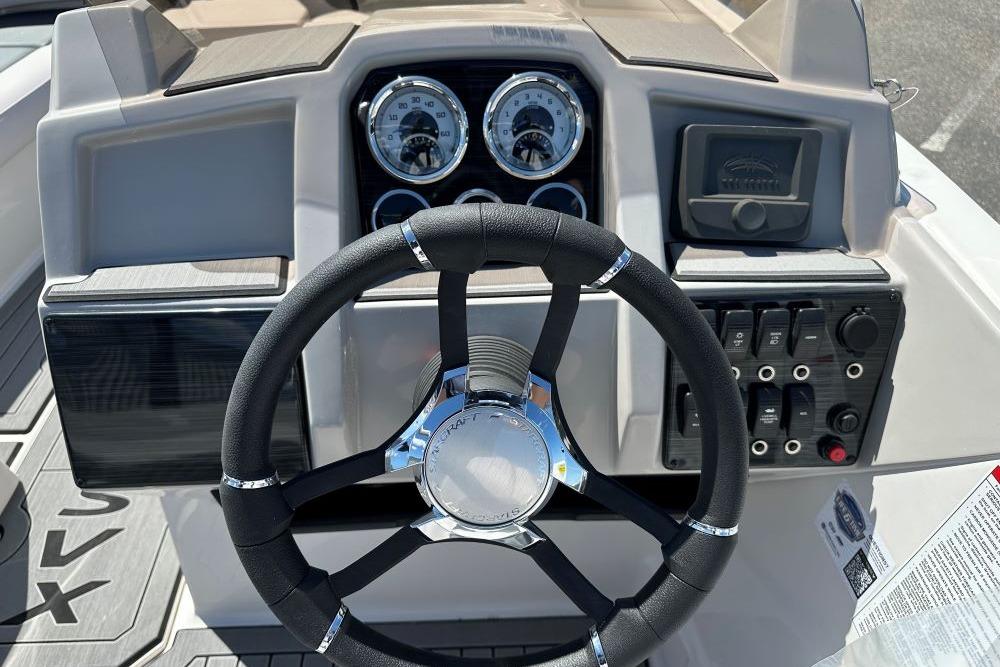 Steering wheel and dashboard of 2026 Starcraft SVX 191 OB boat.