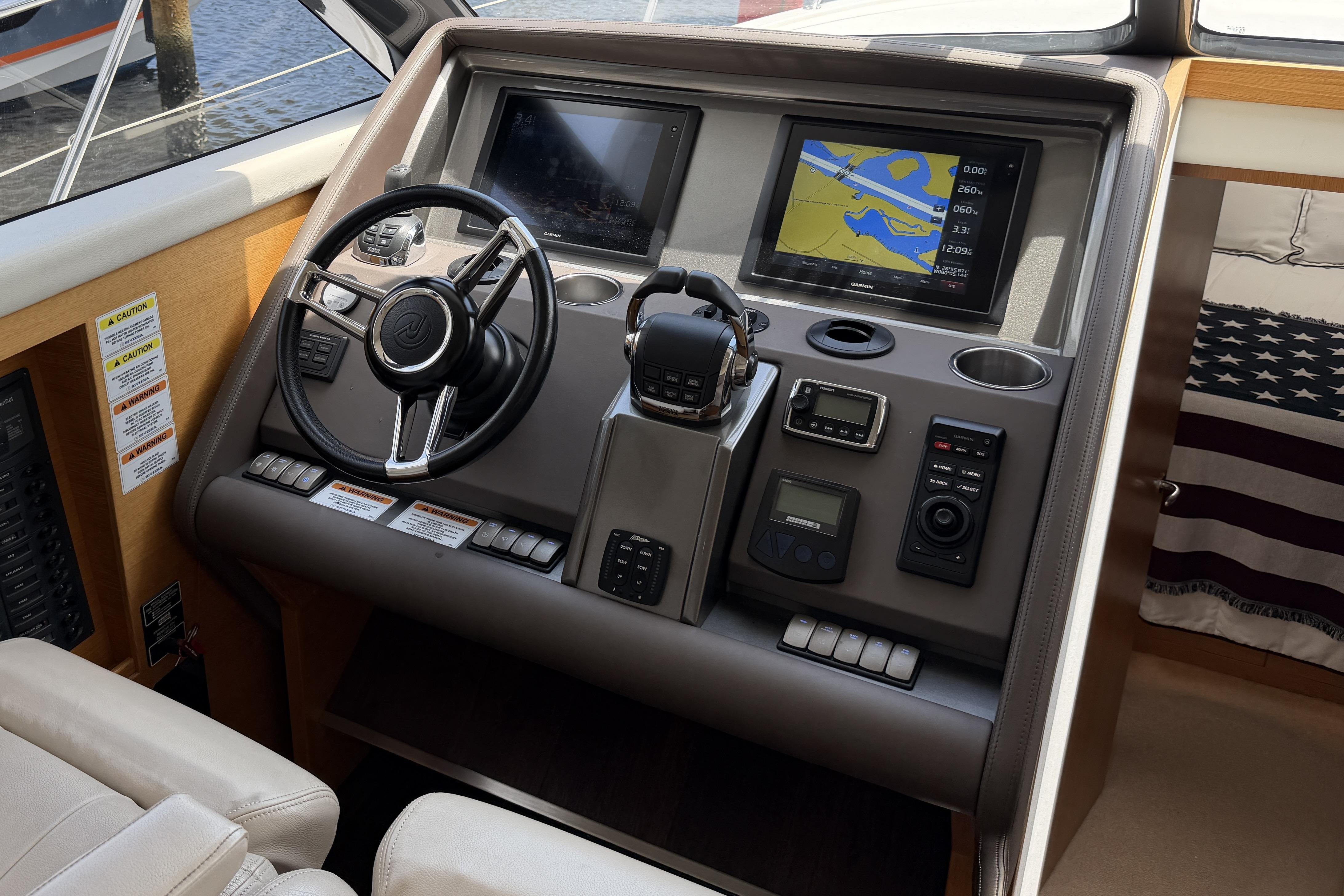 Helm station with complete Garmin electronics set up