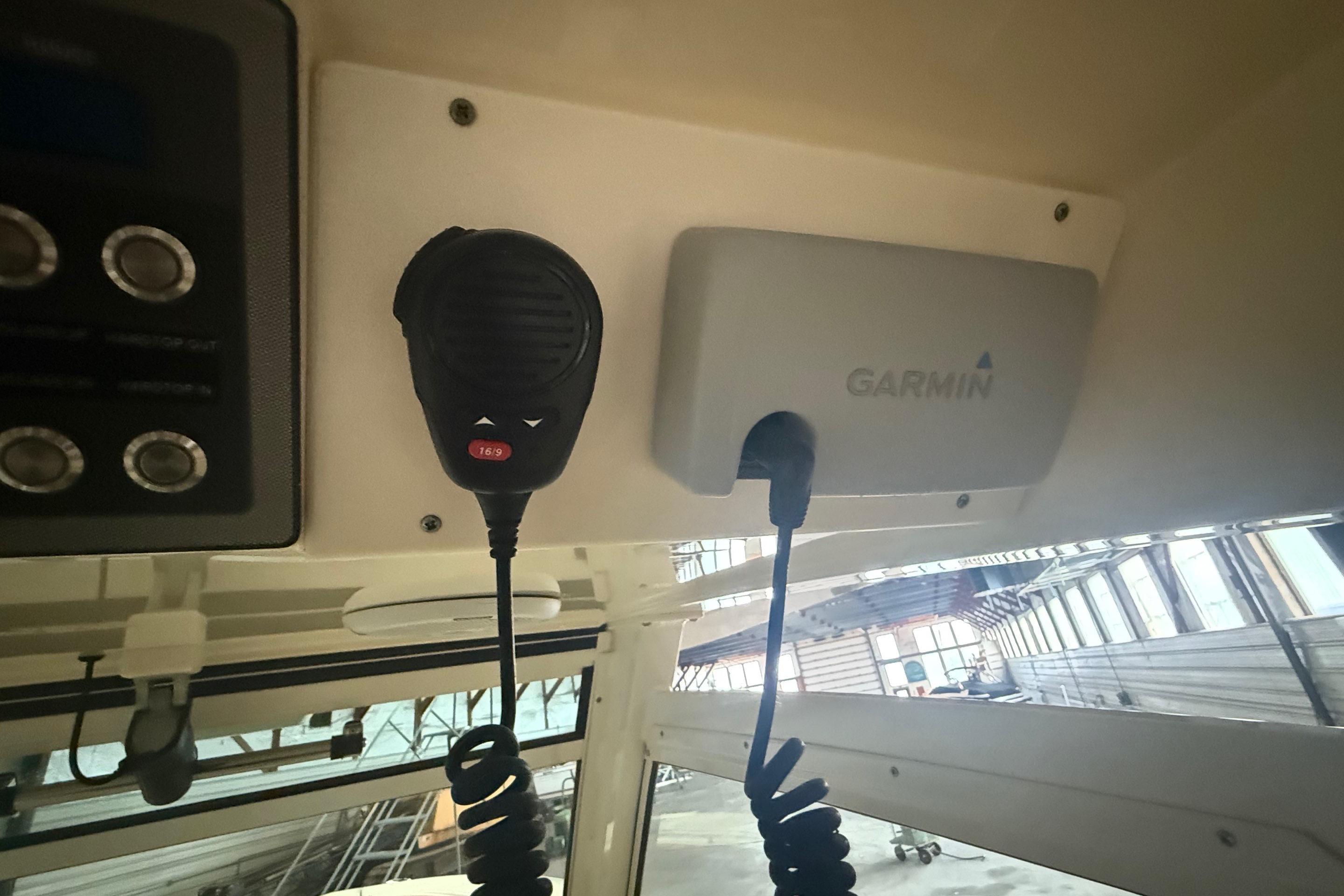 2016 Scout 350 LXF boat interior with Garmin marine equipment and communication device.