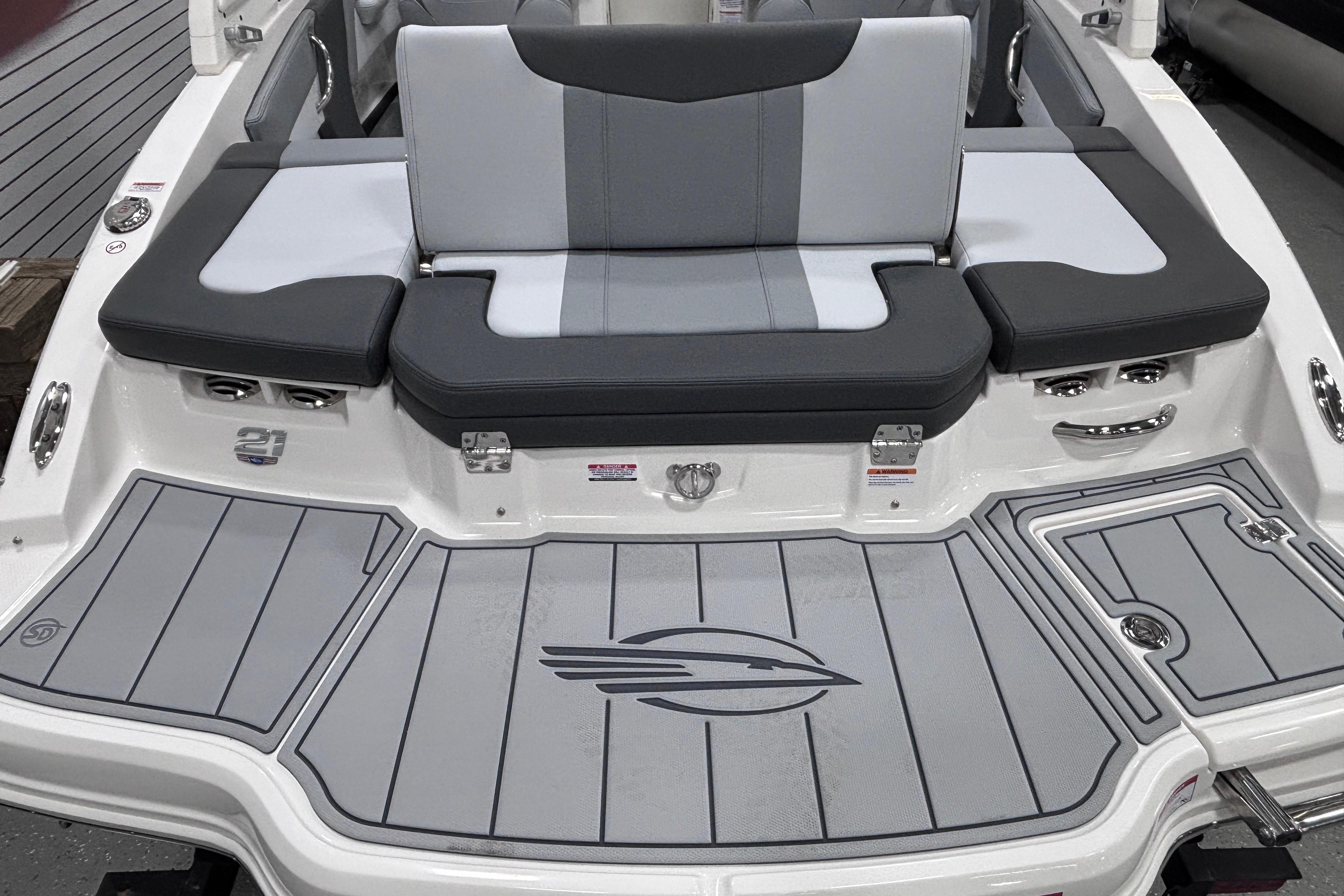 2026 Chaparral 21 SSi boat with sleek gray seating and deck design.
