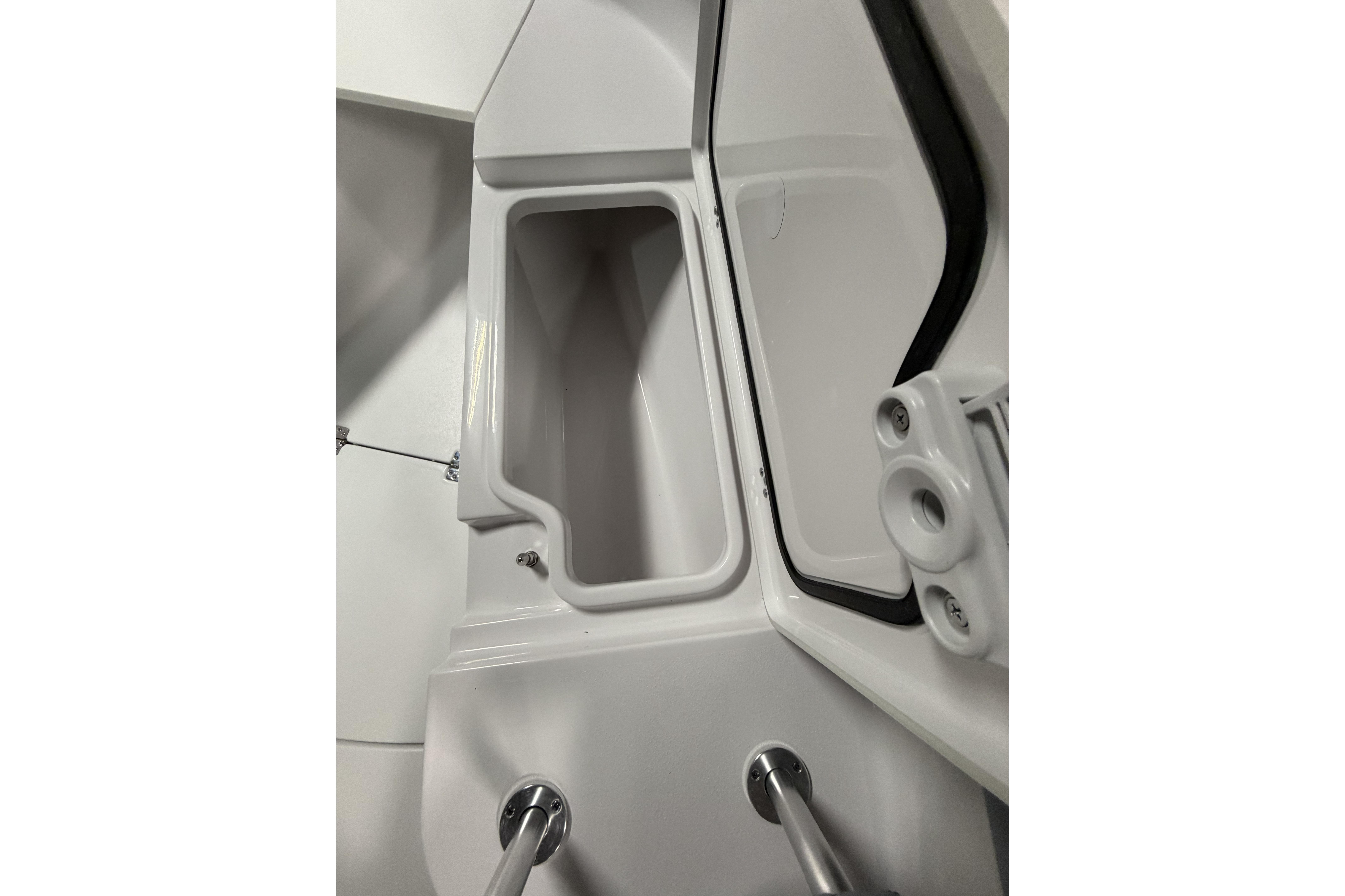 2026 Sportsman Open 232 Center Console storage compartment detail.