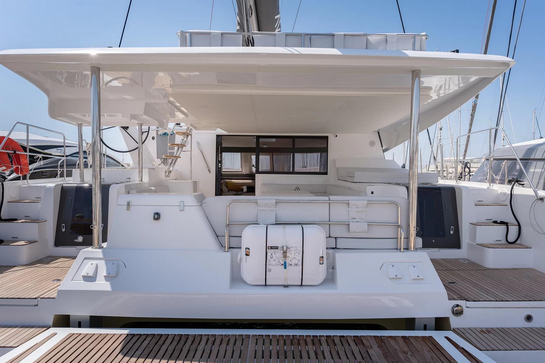2024 Aventura 45 yacht stern view with spacious deck and seating area.