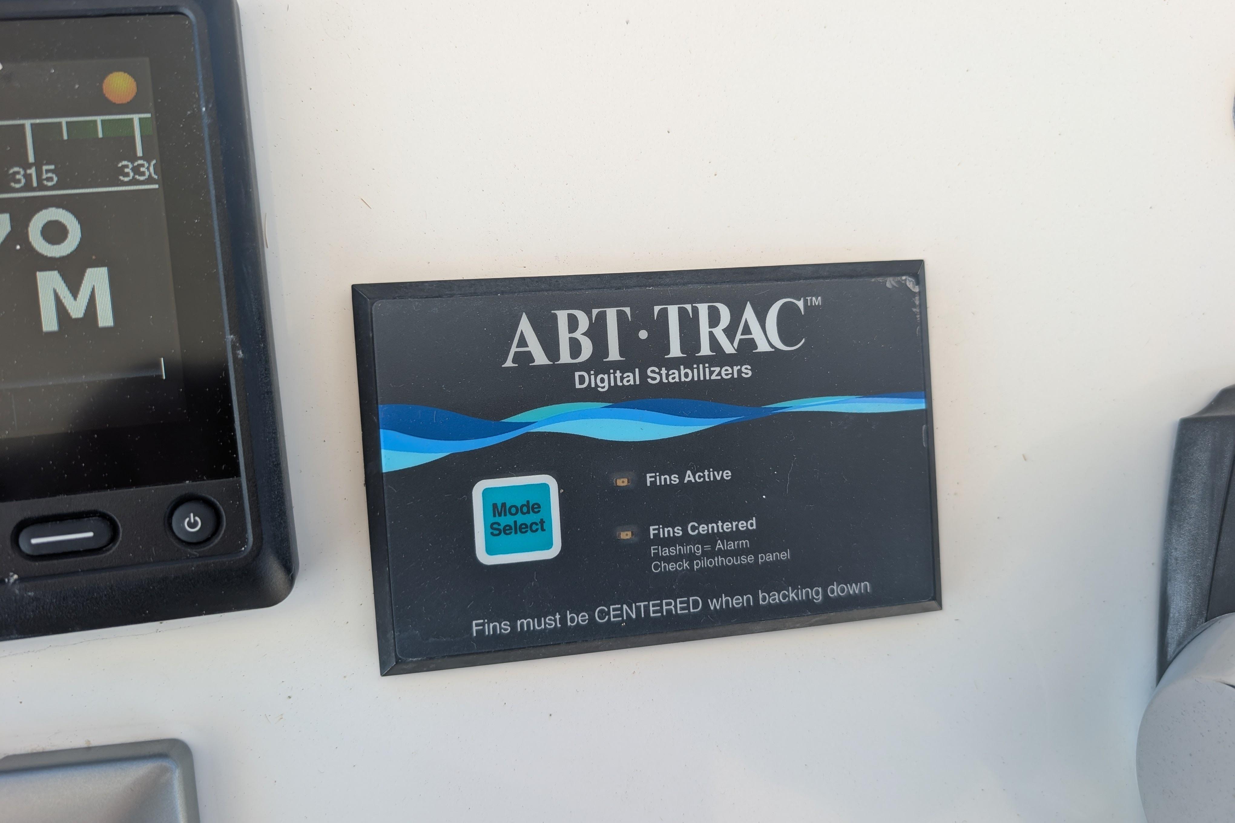 ABT-TRAC digital stabilizers panel on 2015 American Tug 435 boat dashboard.