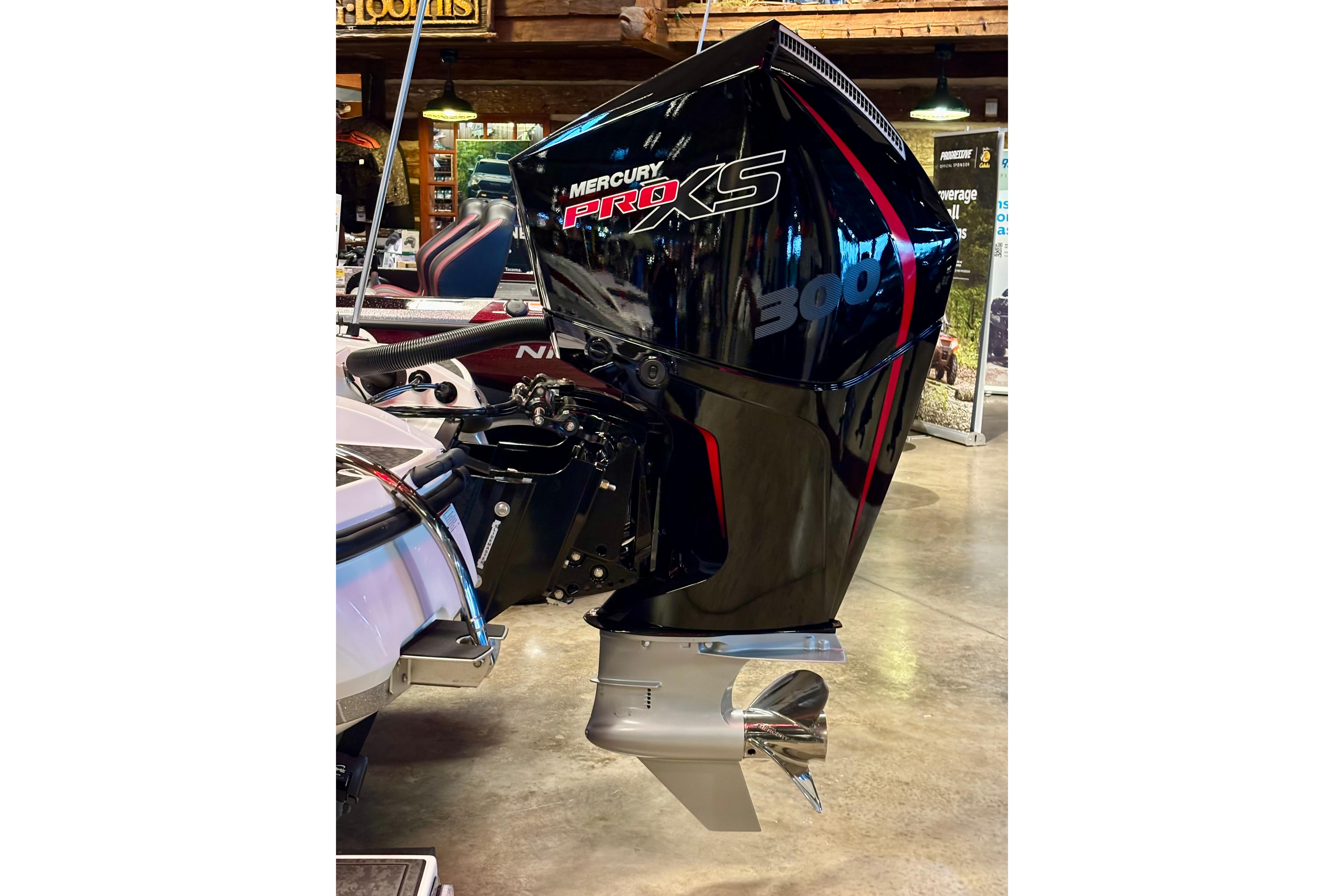 2026 Nitro Z21 XL Pro with Mercury Pro XS 300 outboard engine in showroom.