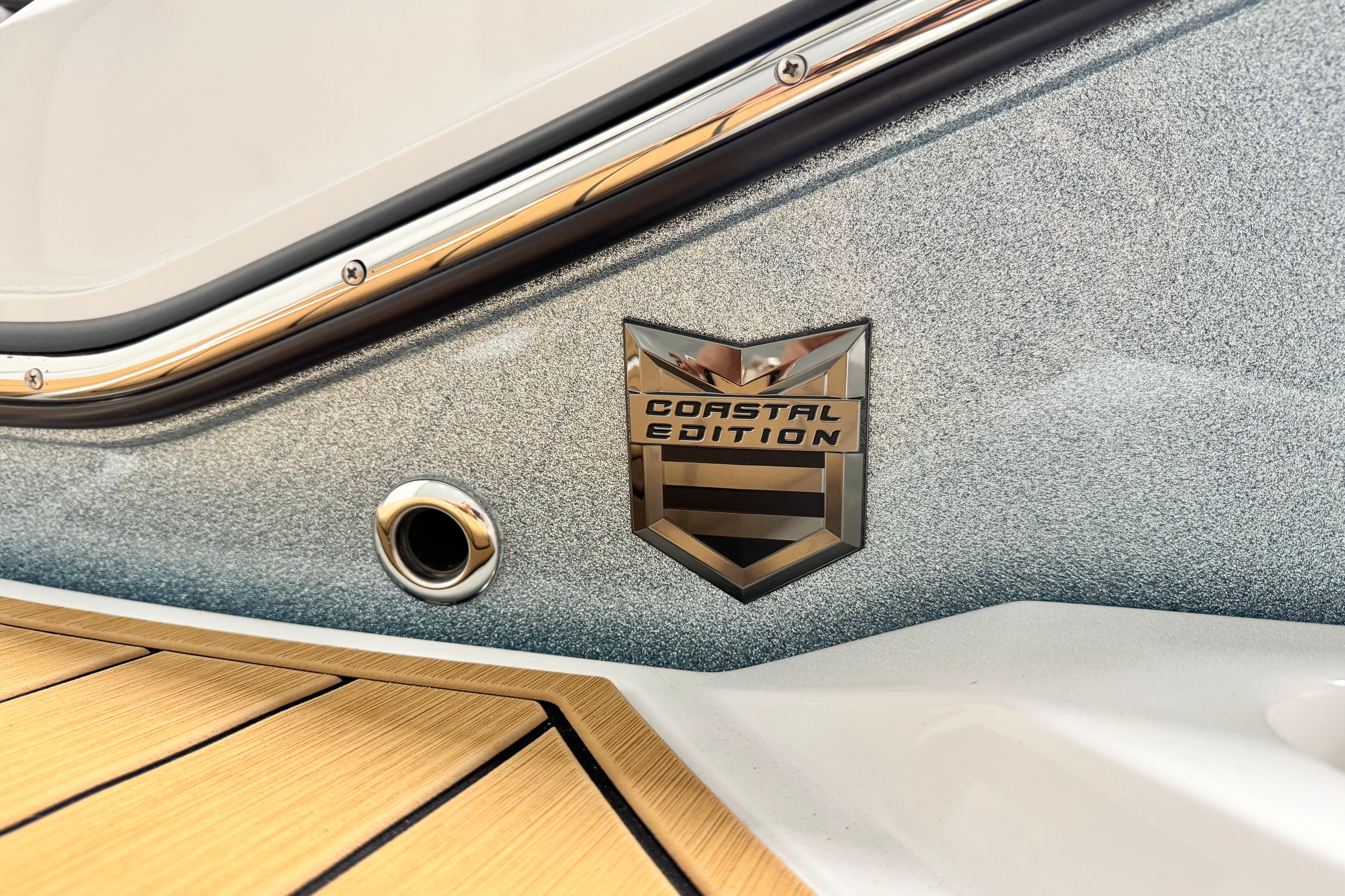 2026 Nautique Super Air Nautique G23 Paragon Coastal Edition badge on boat exterior.