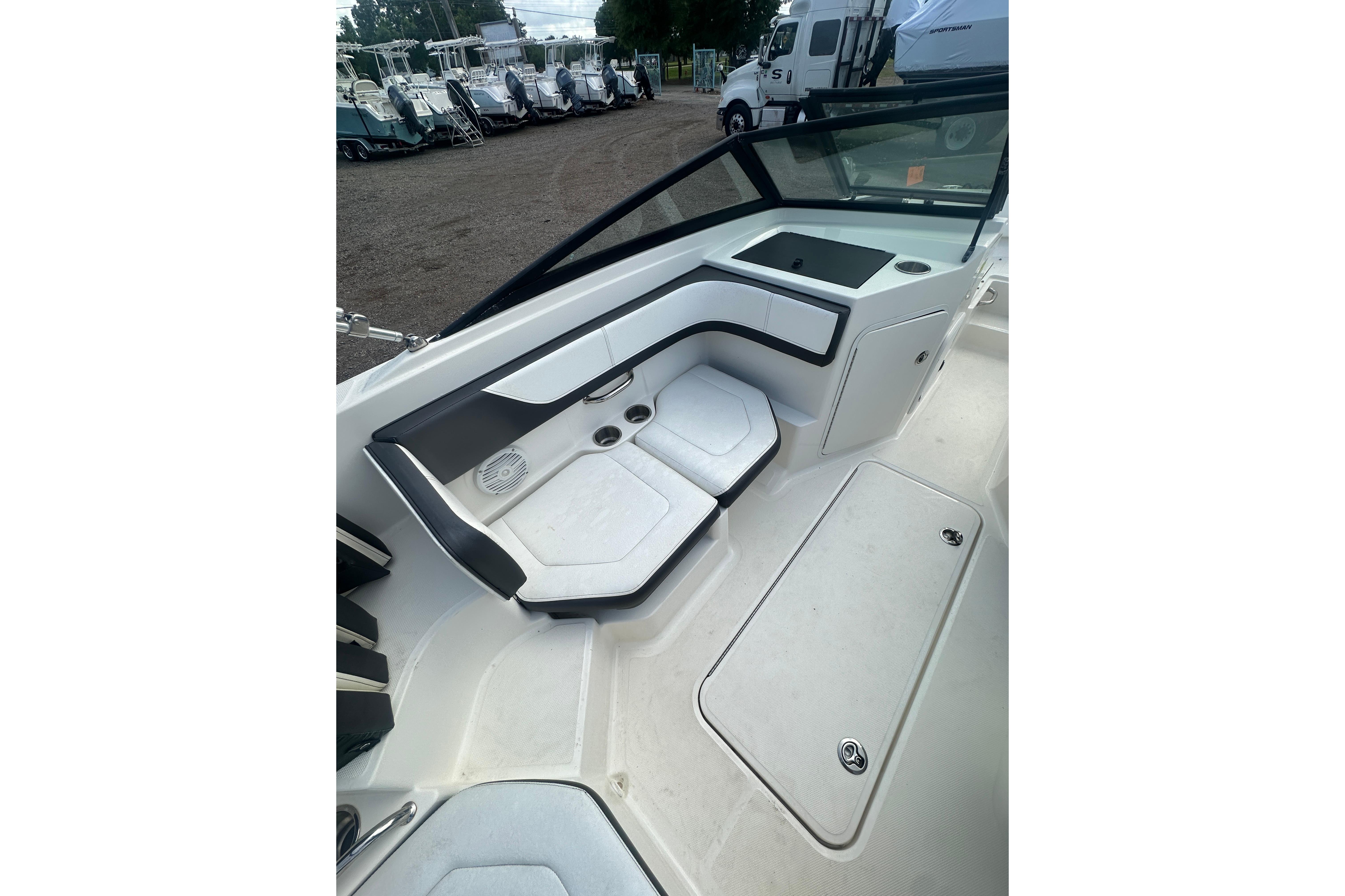 2017 Sea Ray SPX 190 Outboard boat interior with seating and storage compartments.