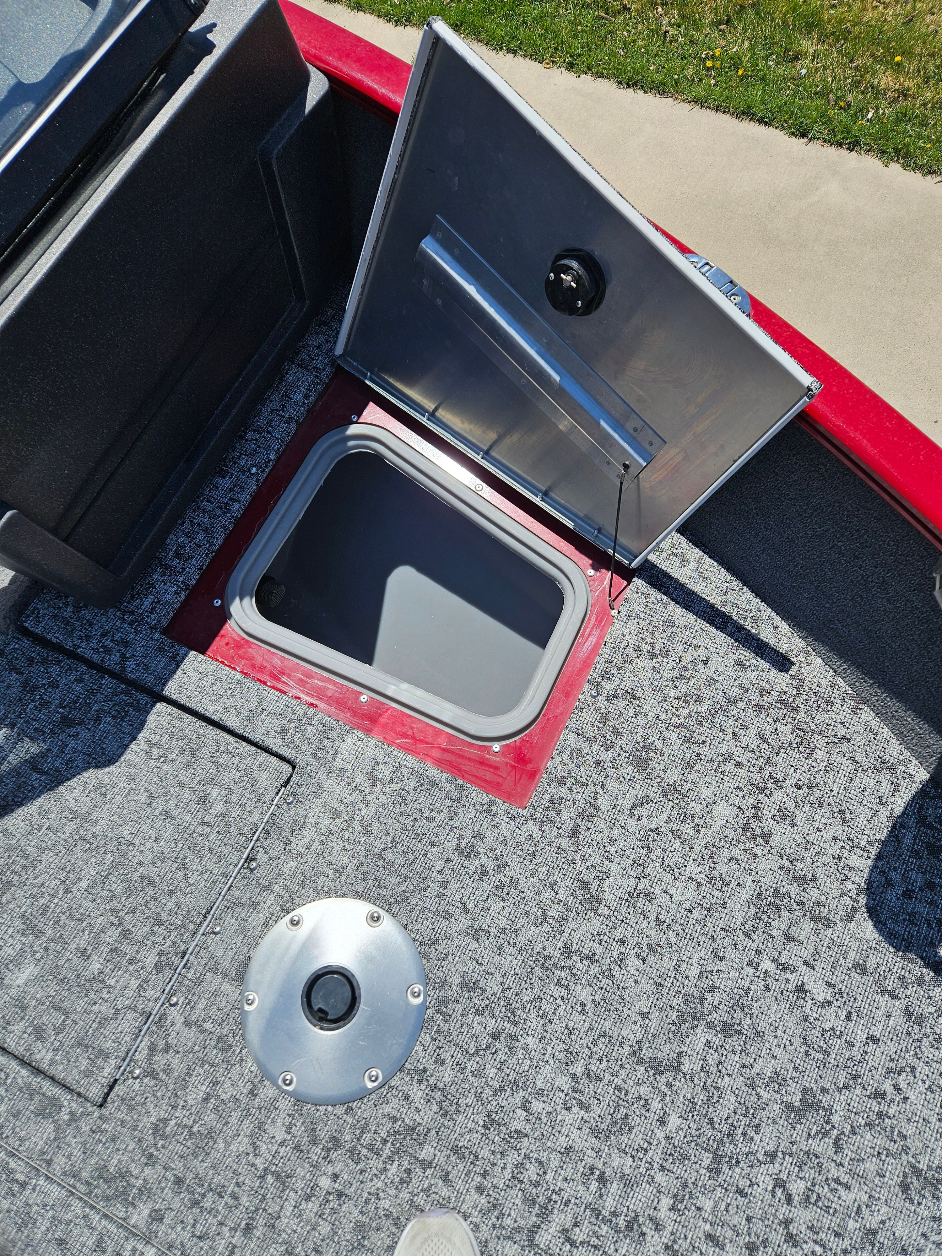 2021 Tracker Pro Guide V-175 WT with open storage compartment.