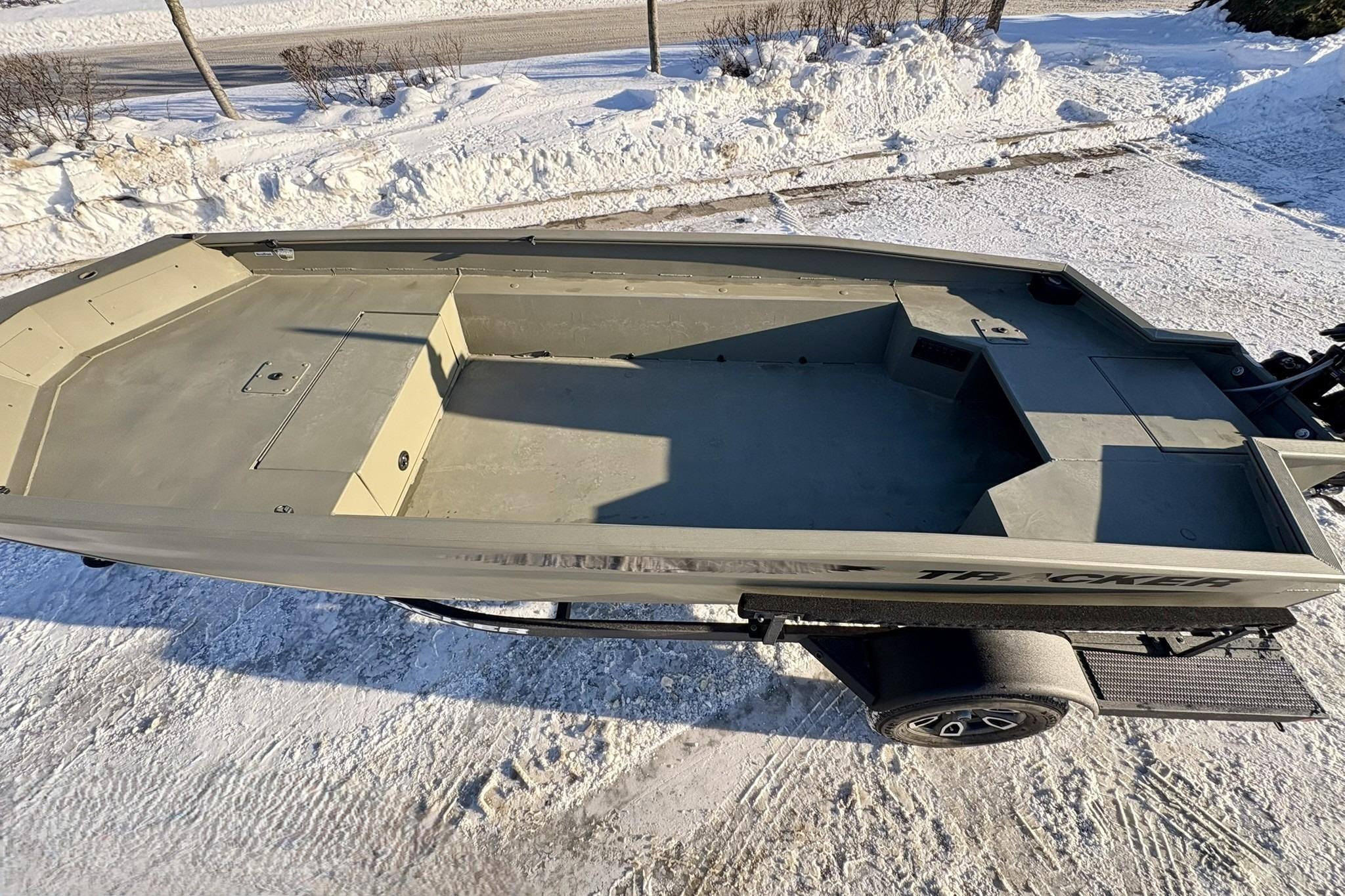 2025 Tracker Grizzly 1650 T Prairie Wings Edition boat on snowy ground.