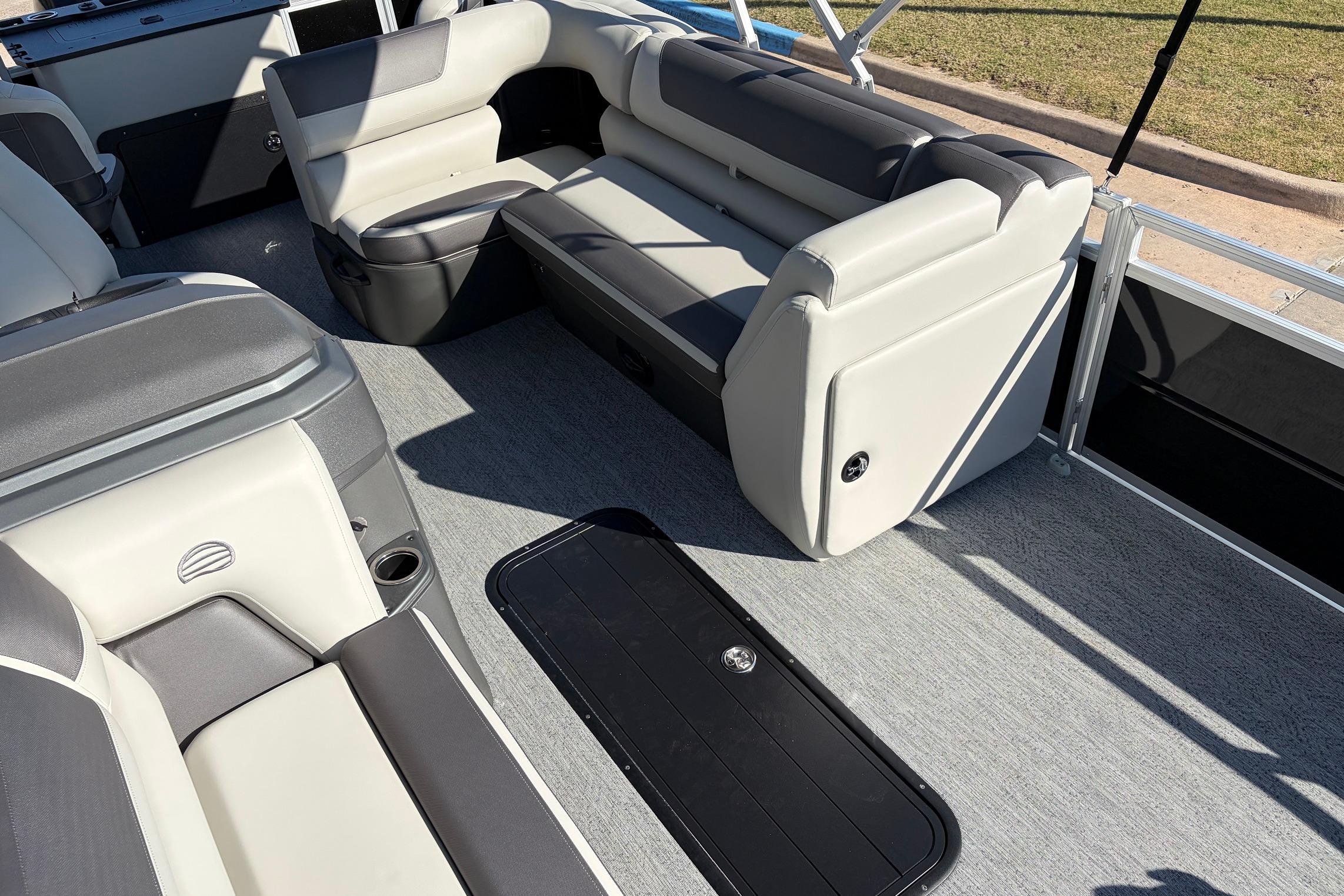 2026 Sun Tracker Fishin' Barge 22 XP3 interior with comfortable seating and modern design.