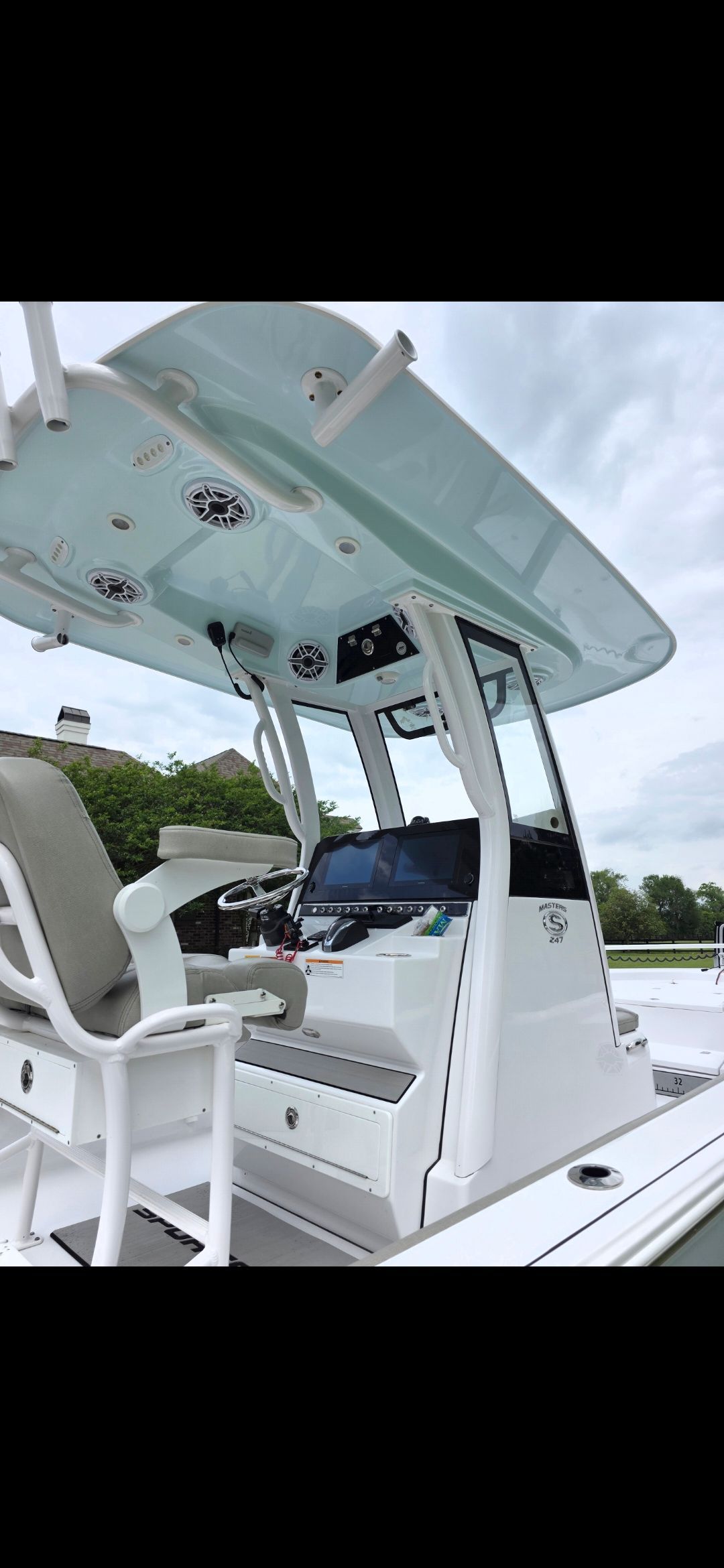 2023 Sportsman Masters 247 Bay Boat with modern helm console.