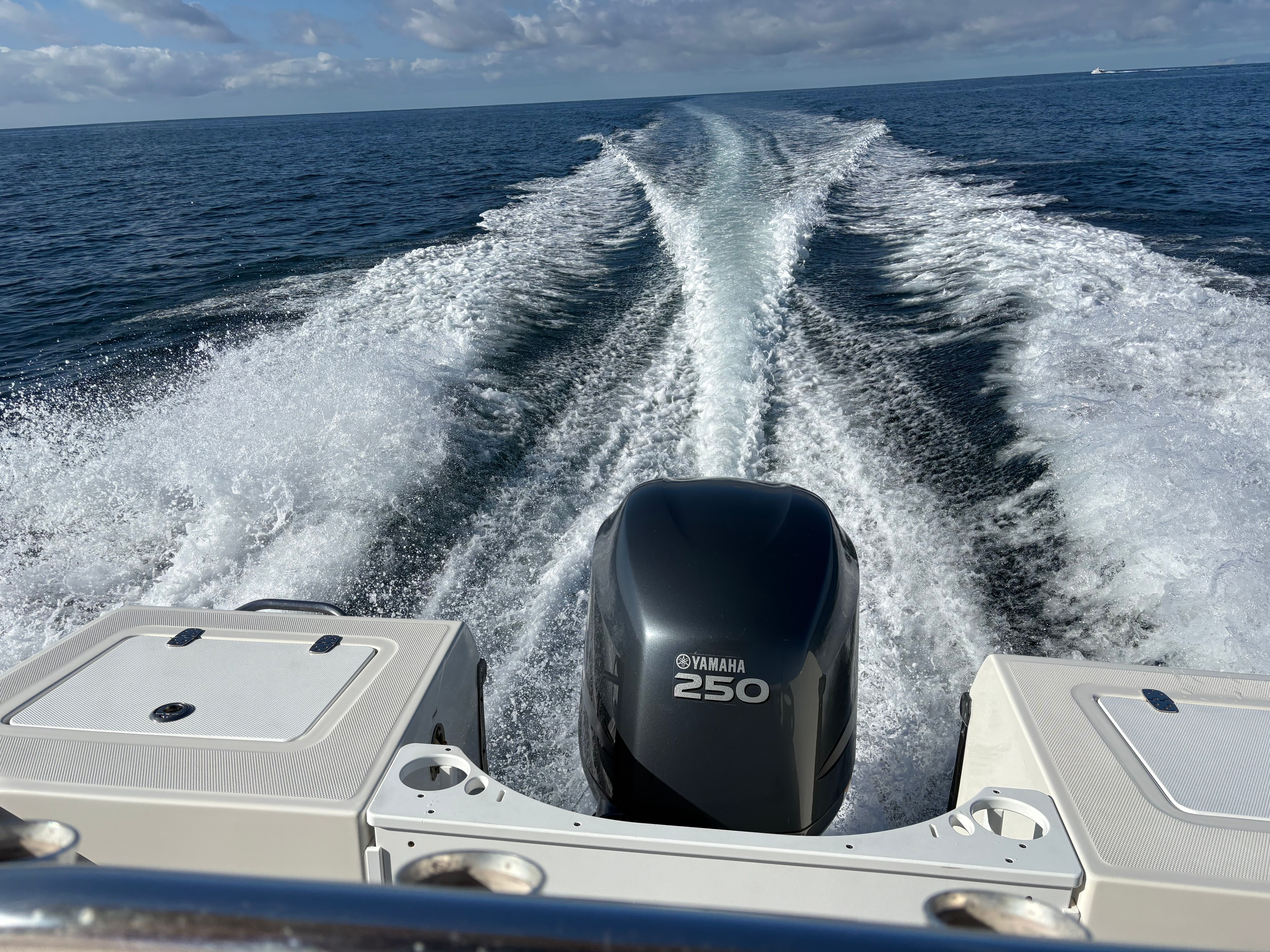 Edgewater 228CC boat with Yamaha 250 engine on open sea, 2008 model.