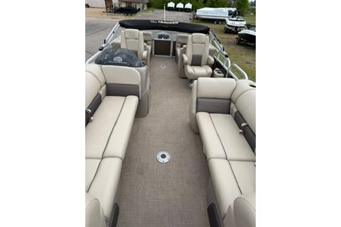 2022 SUNTRACKER Party Barge 22 interior with beige seating and spacious layout.