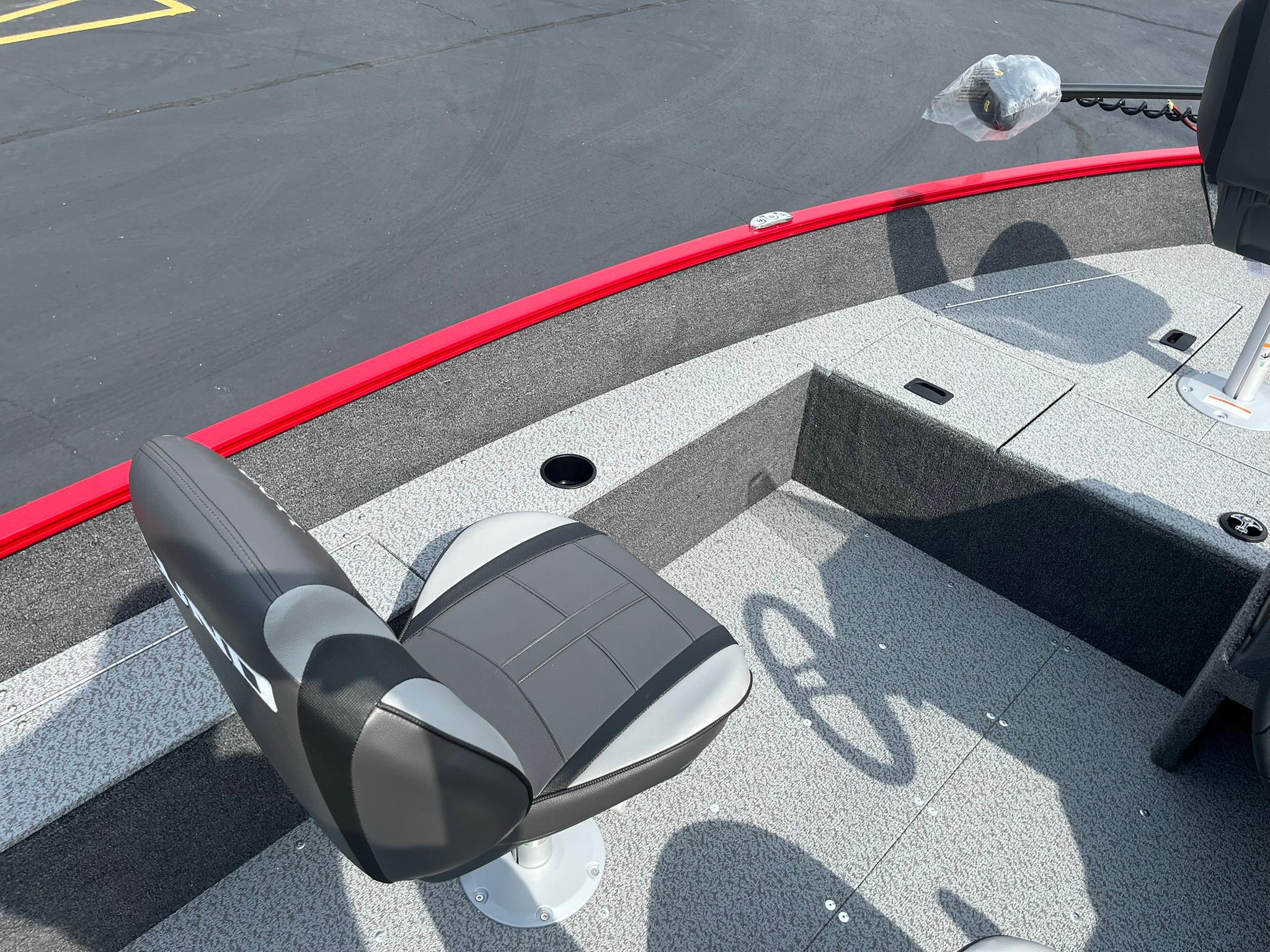 2026 Lund 1650 Angler SS boat interior with seating and steering wheel.