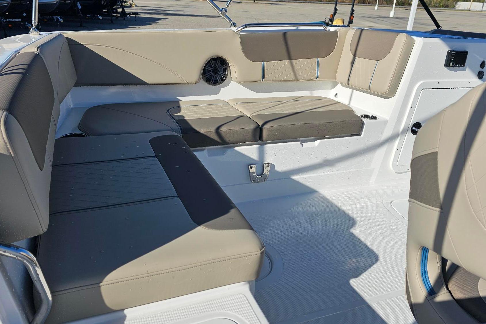 2026 Tahoe 2150 boat interior with beige seating and modern design.
