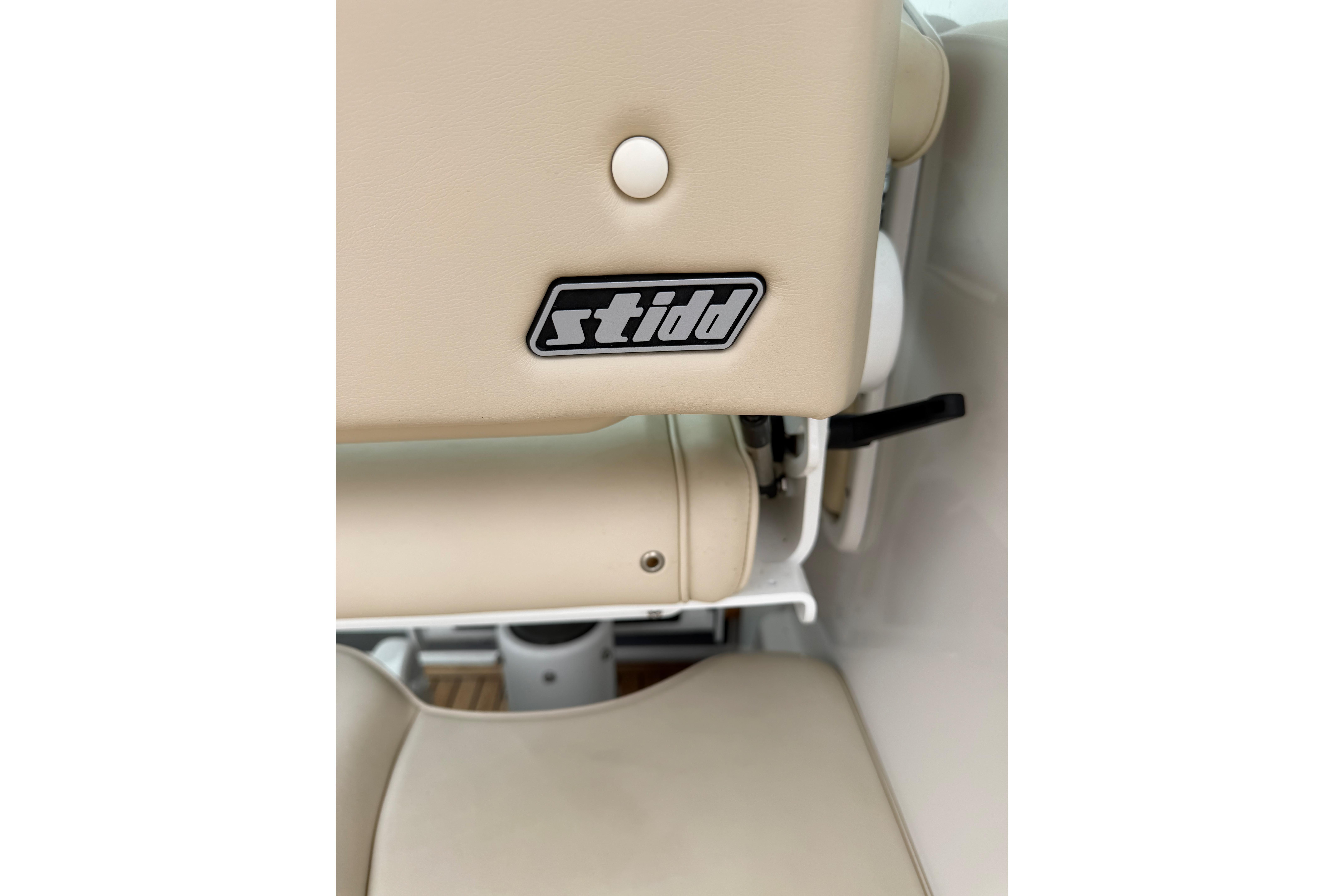 Beige Stidd seat on 2016 Protector Targa 30 boat, showcasing comfort and design.