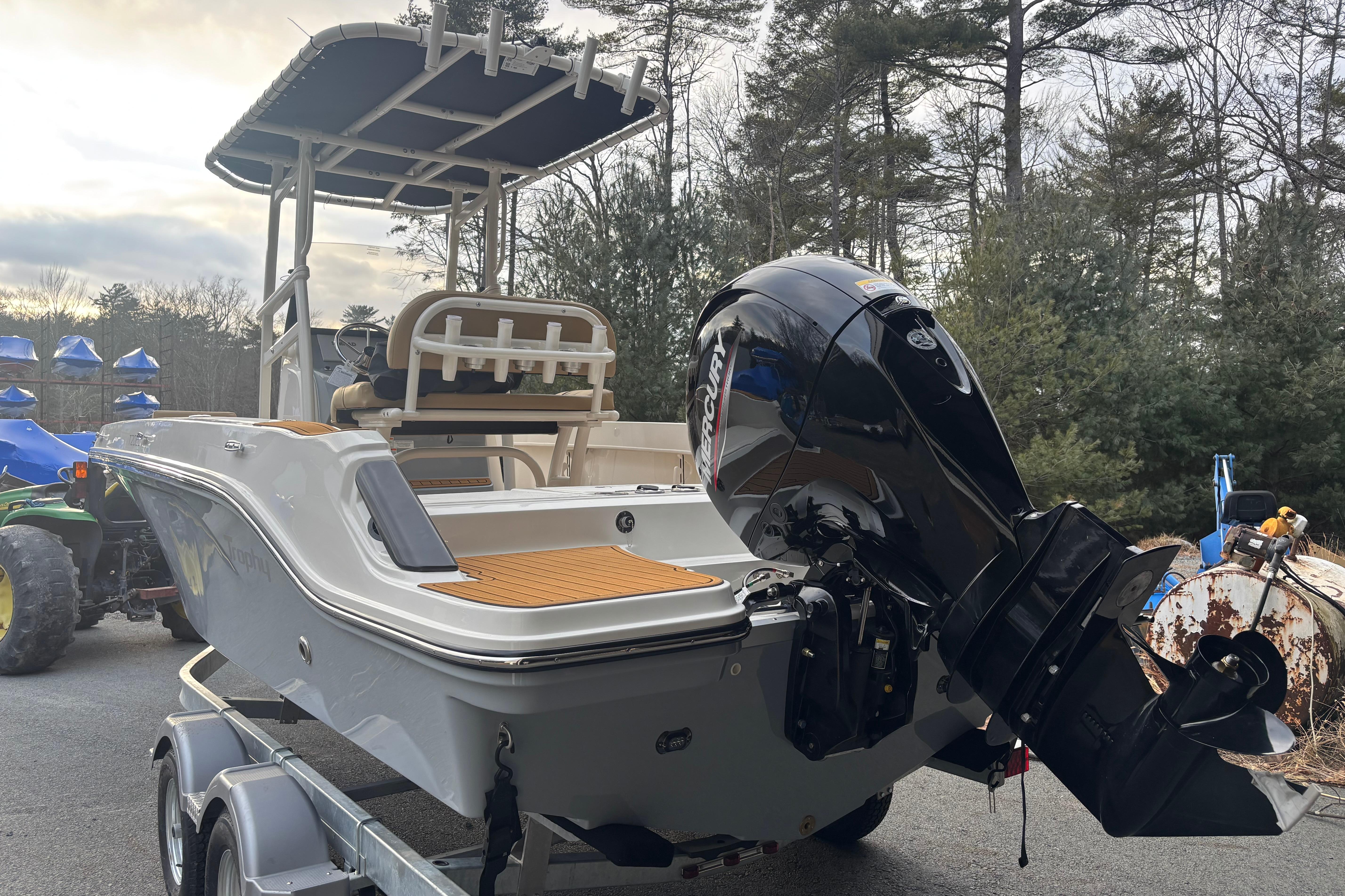 2026 Bayliner Trophy T20CC boat on trailer with Mercury outboard motor.
