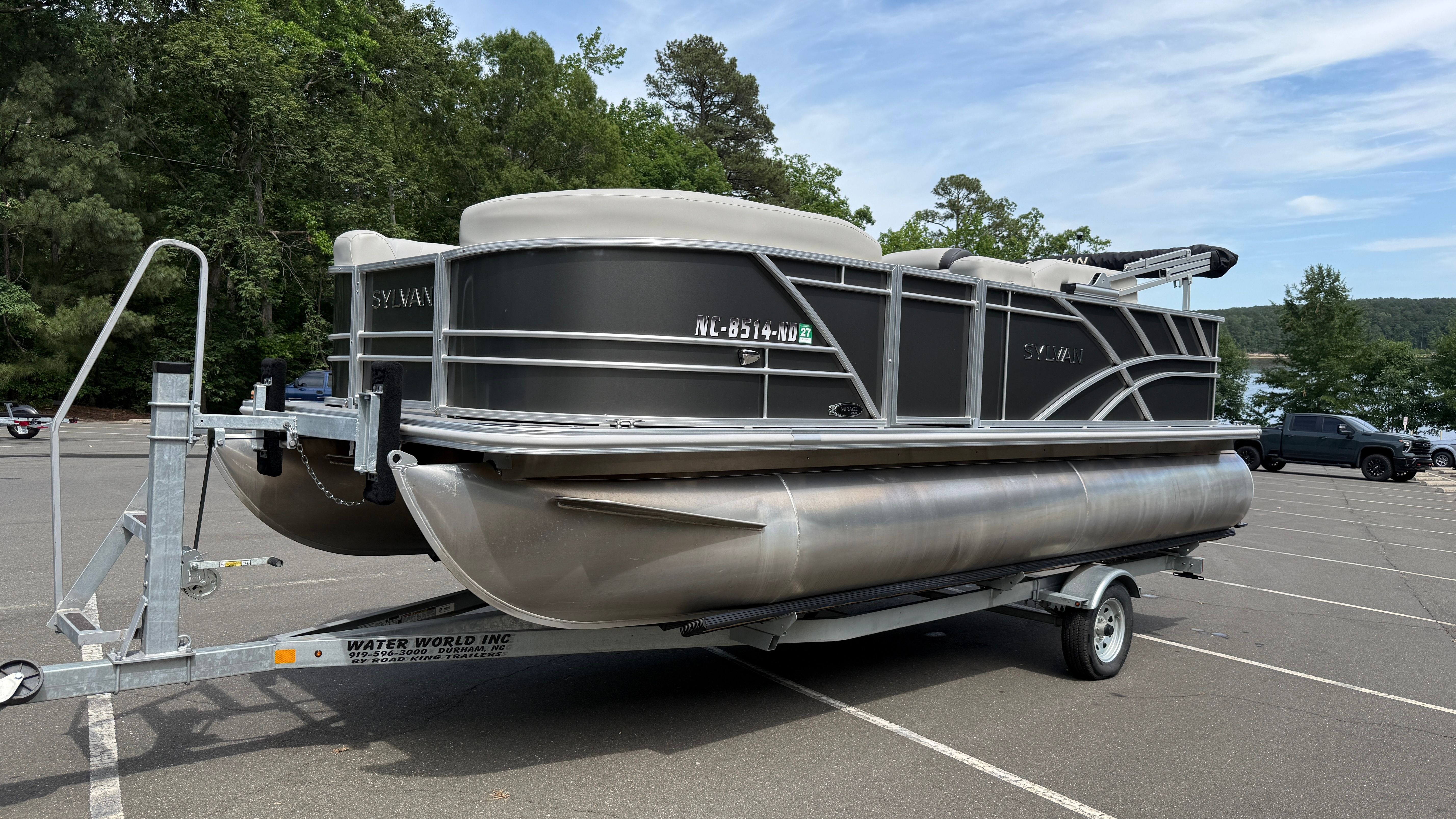 2025 Sylvan Mirage Fish 8520 Party Fish on trailer outdoors.
