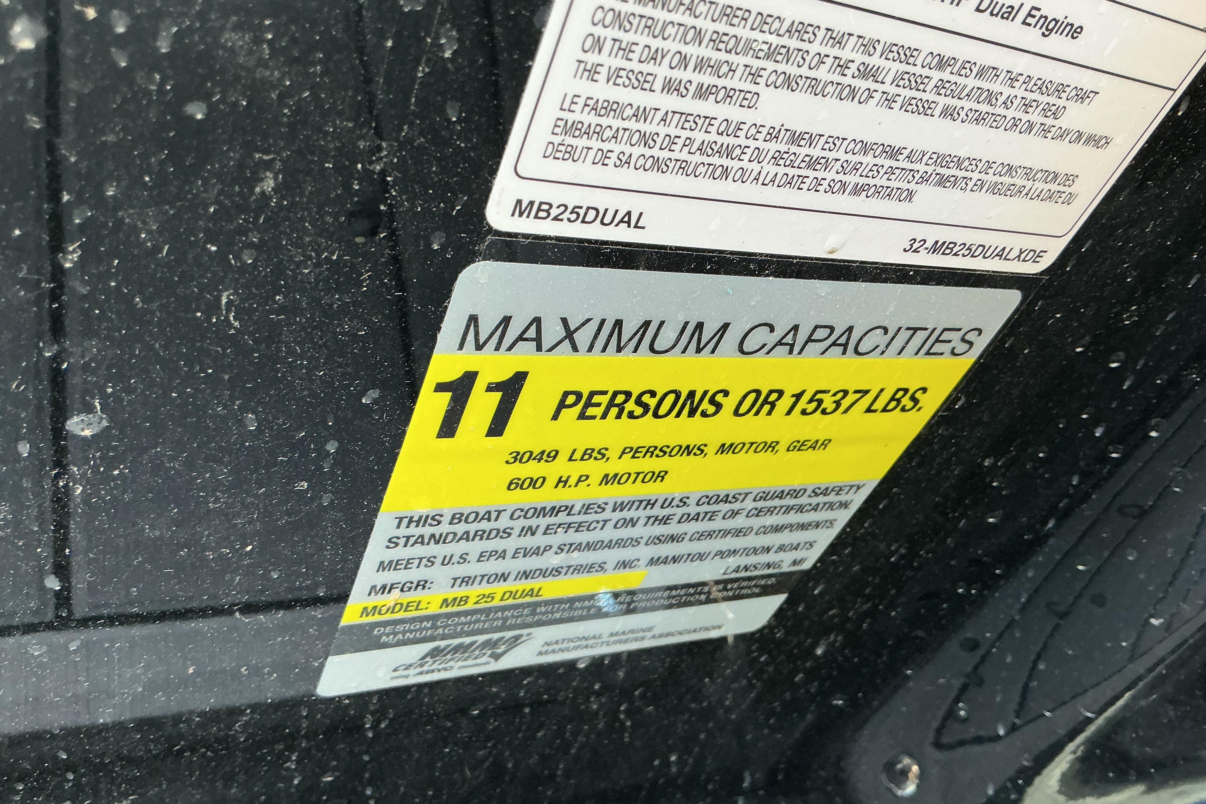 2024 Manitou 25 X-Plode XT SRS capacity label, 11 persons or 1537 lbs, 600 HP motor.