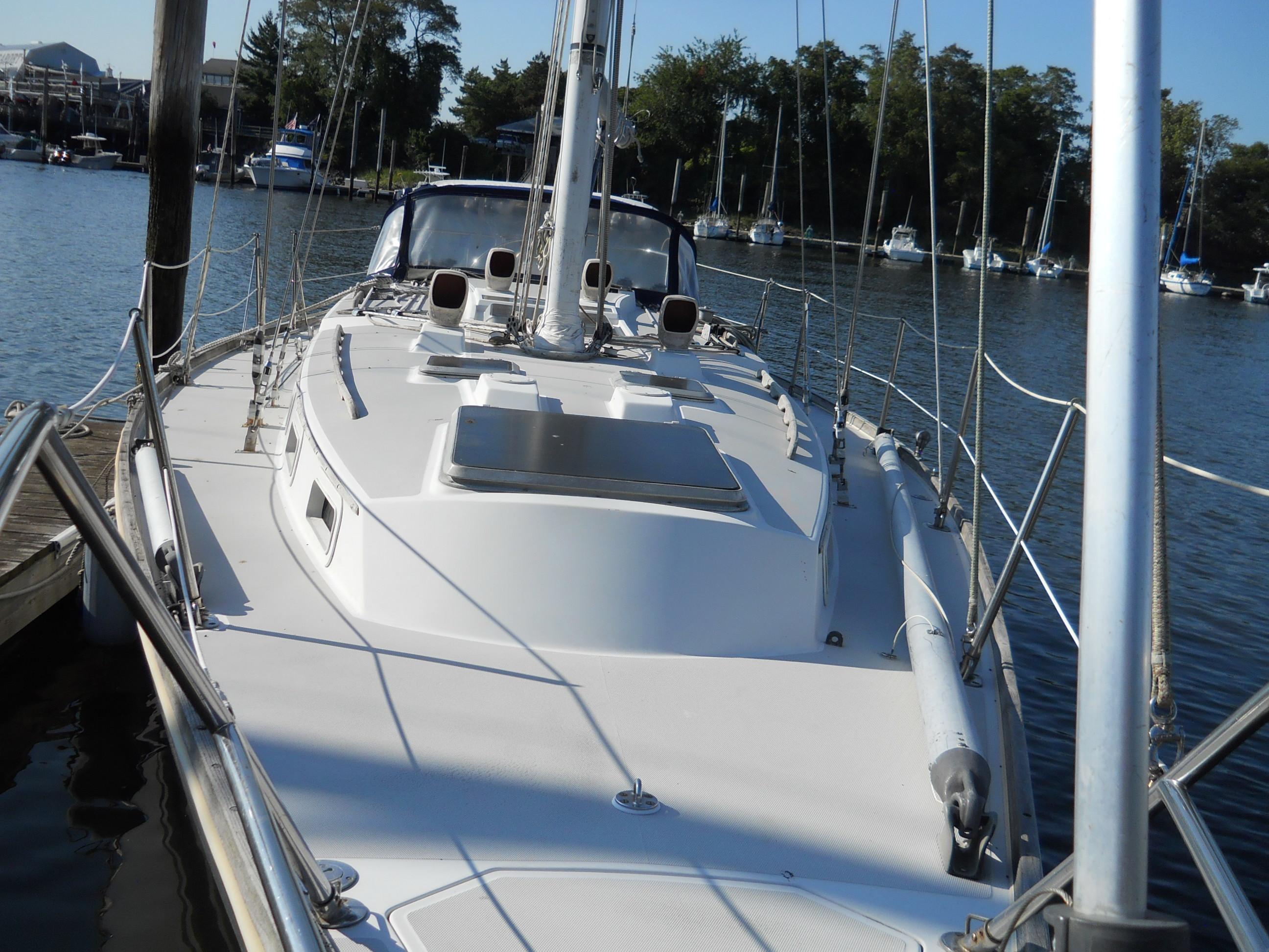1985 Sabre 38 MK I sailboat docked, showcasing deck and rigging.
