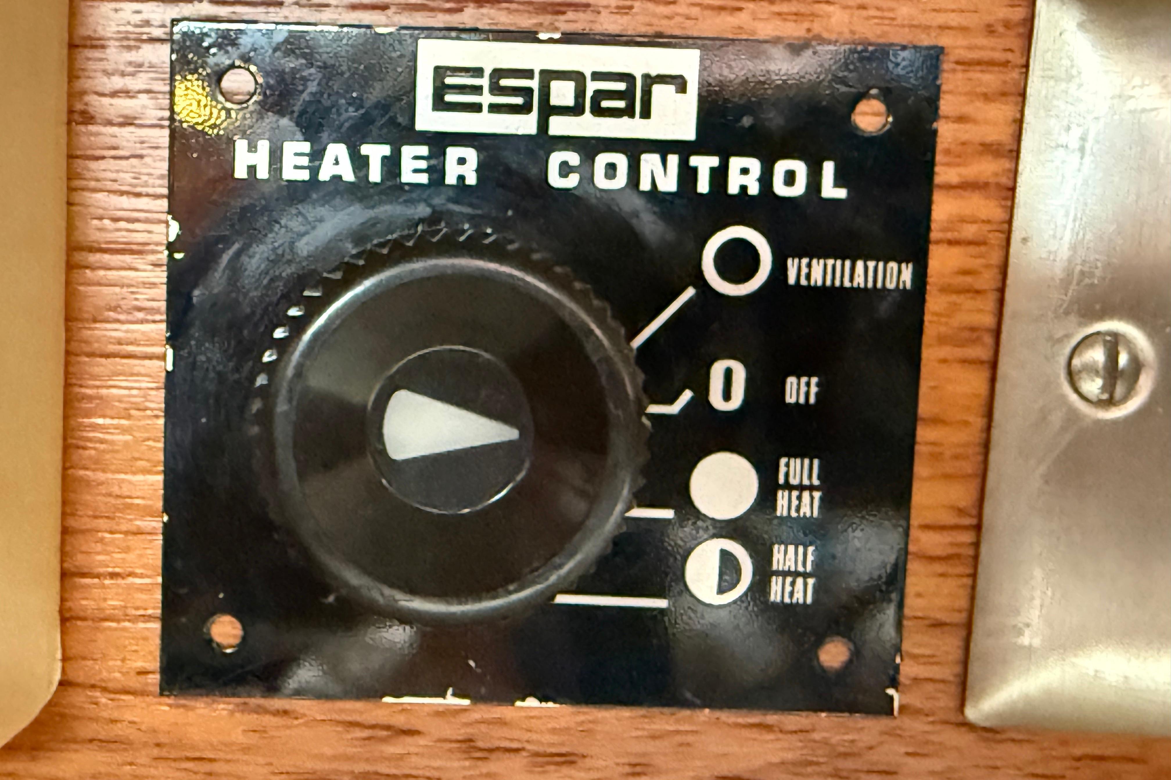 Espar heater control panel on 1988 Ericson 32-200 sailboat, featuring ventilation and heat settings.