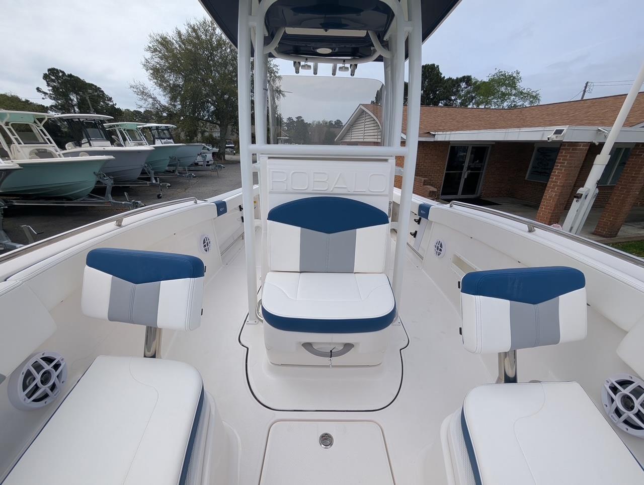 2025 Robalo R222 Explorer boat interior with blue and white seating.