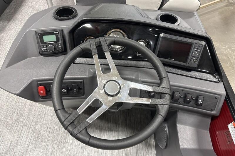 Steering console of 2026 Bennington 22 SSRSF boat with modern controls and gauges.