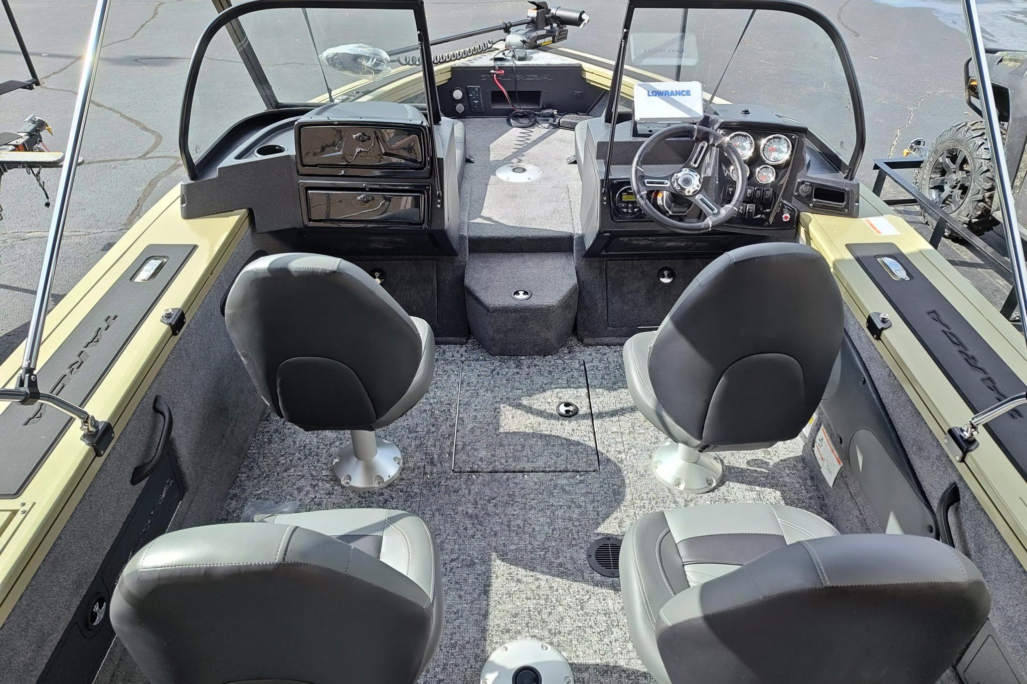 2026 Tracker Targa V-18 Combo boat interior with four seats and modern dashboard.