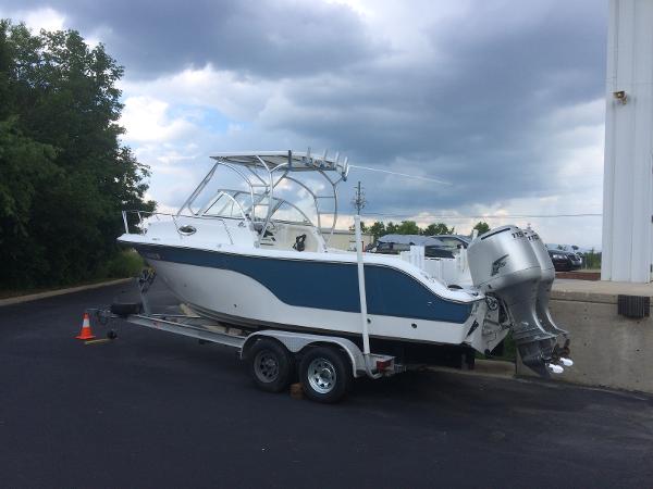 2008 Sea Fox 236WA Pro Series boat on a trailer, parked outdoors.