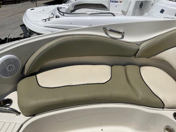 2005 Sea Ray 220 Sundeck boat interior with beige and olive seating.