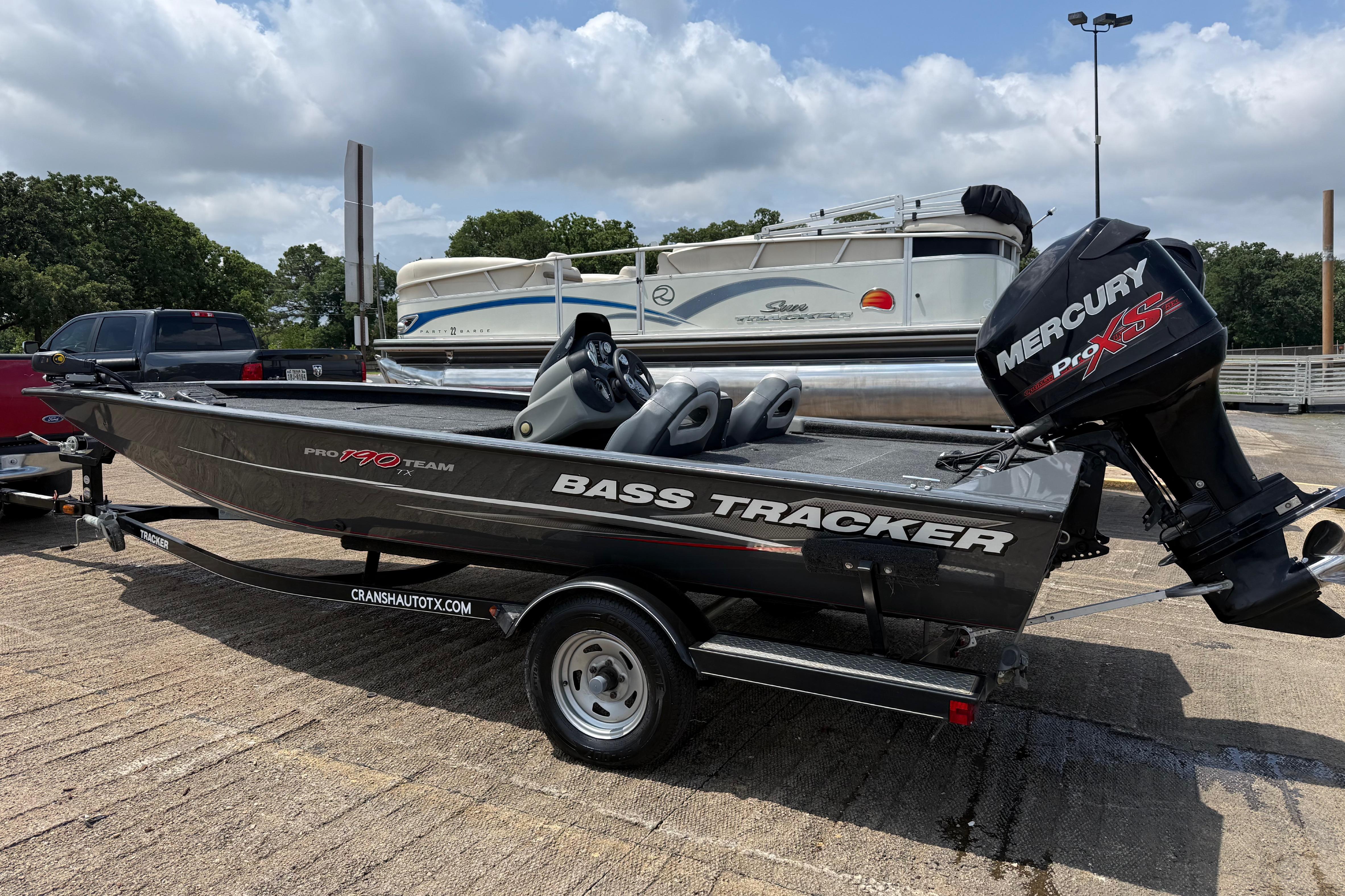 2015 Tracker Pro Team 190 TX bass boat with Mercury Pro XS engine on trailer.