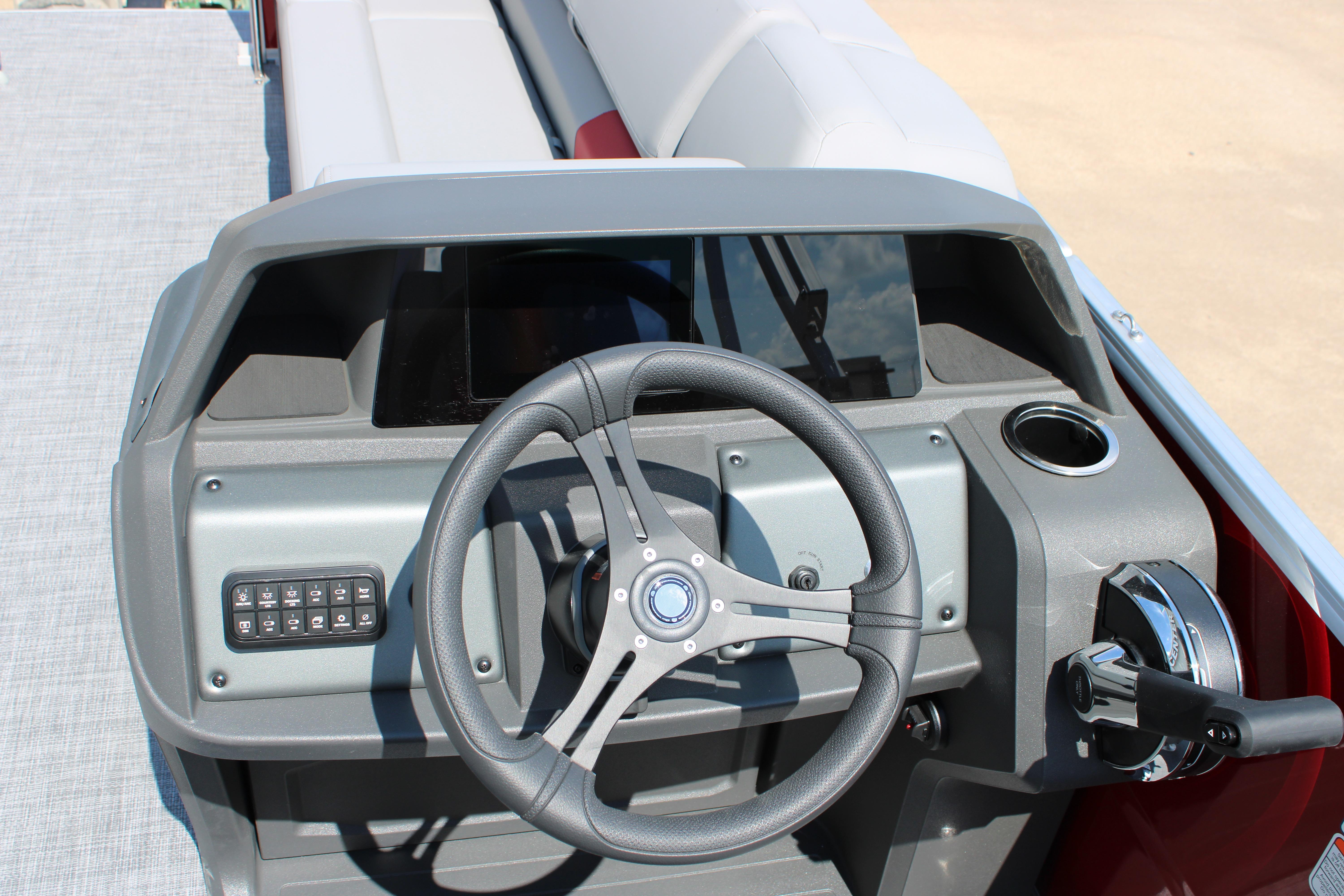 Steering console of 2026 Sun Tracker Party Barge 20 DLX pontoon boat.