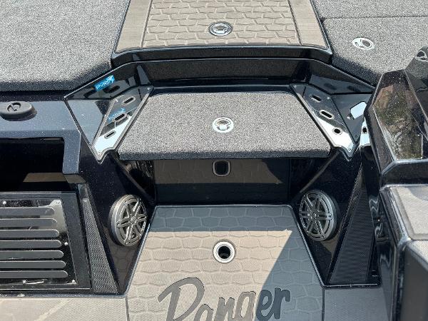 2025 Ranger Z520R Cup-Equipped boat interior with storage compartments and speakers.