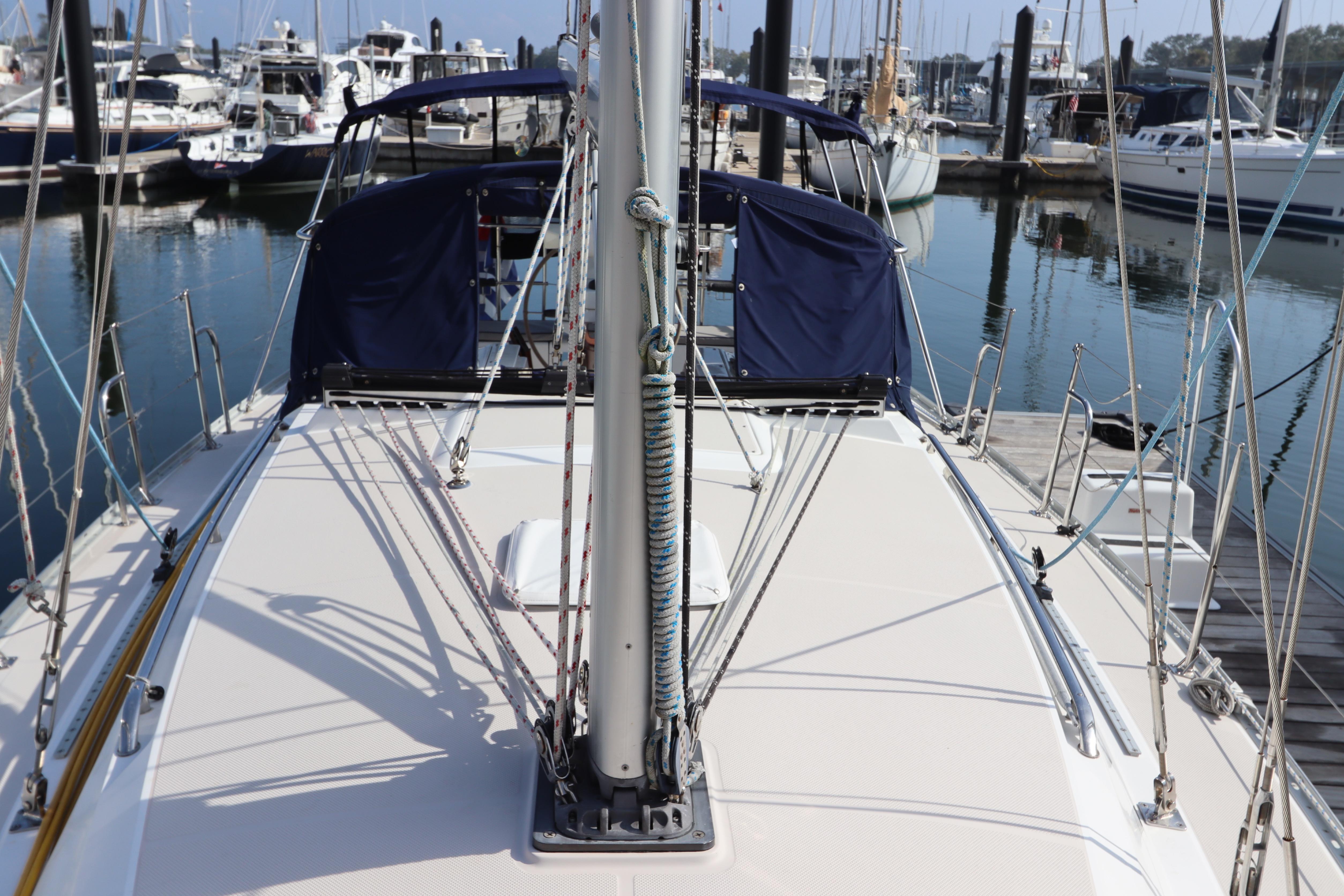 Sailboat Catalina 355, 2011 model, docked at marina with visible rigging and deck.