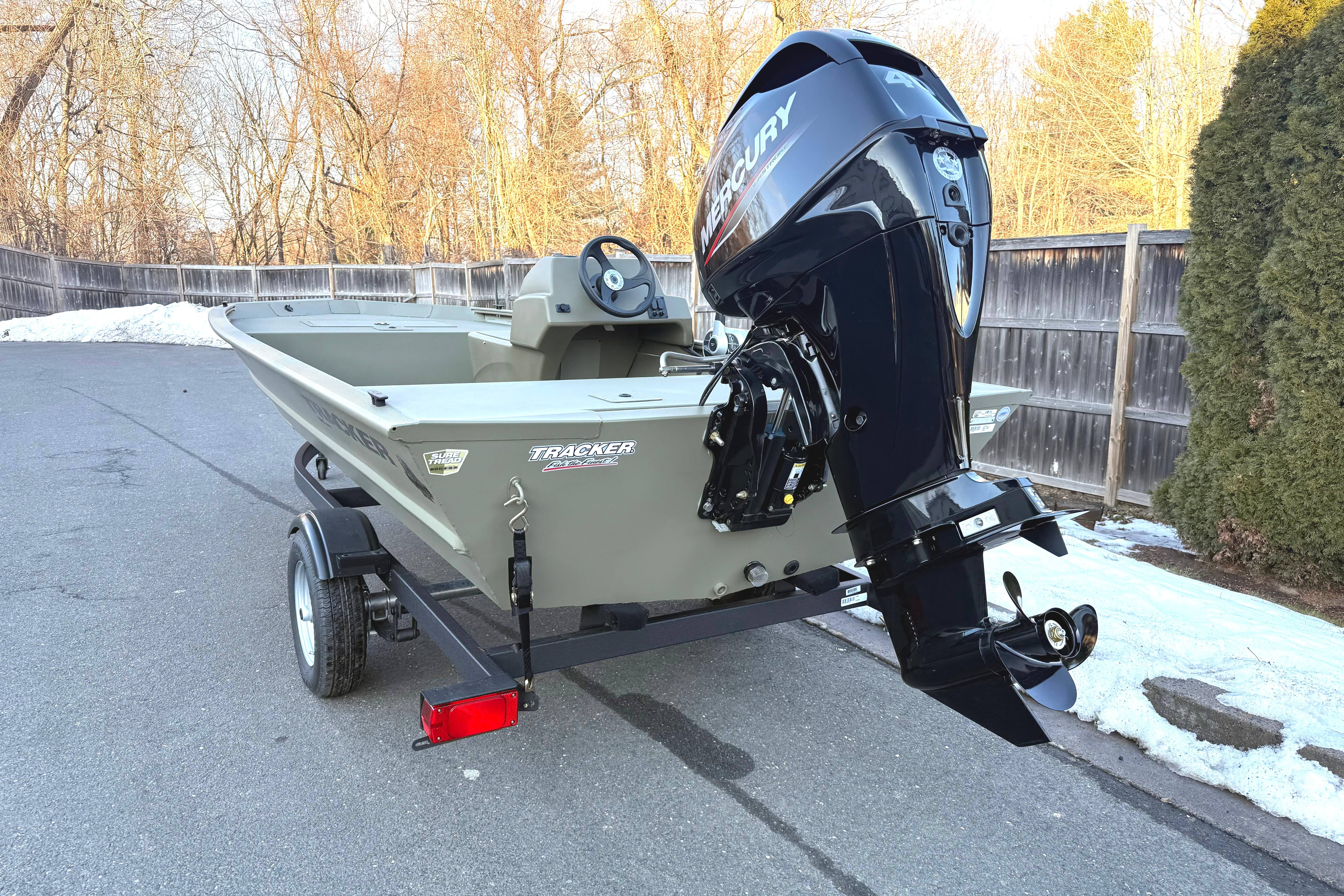 2026 Tracker Grizzly 1648 SC boat with Mercury outboard motor on a trailer.