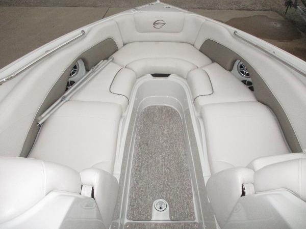 Interior of a 2015 Crownline 285 SS boat with white seating.