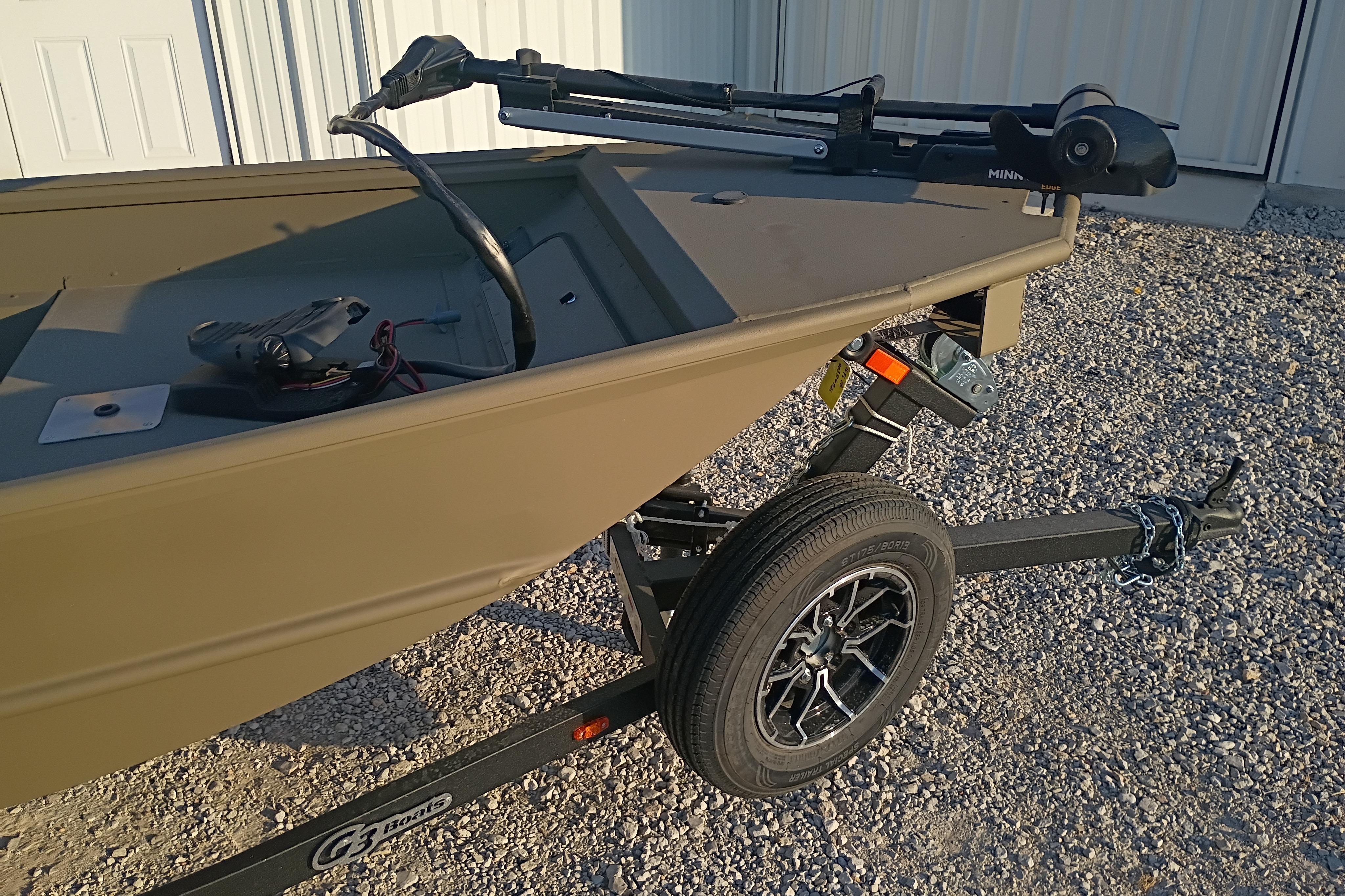 2026 G3 Gator Tough 16 FL boat on trailer, gravel background.