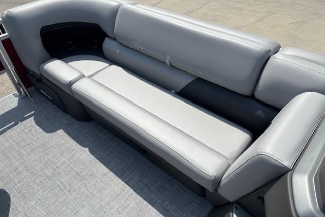 2026 Sun Tracker SportFish 20 DLX boat interior with gray cushioned seating.