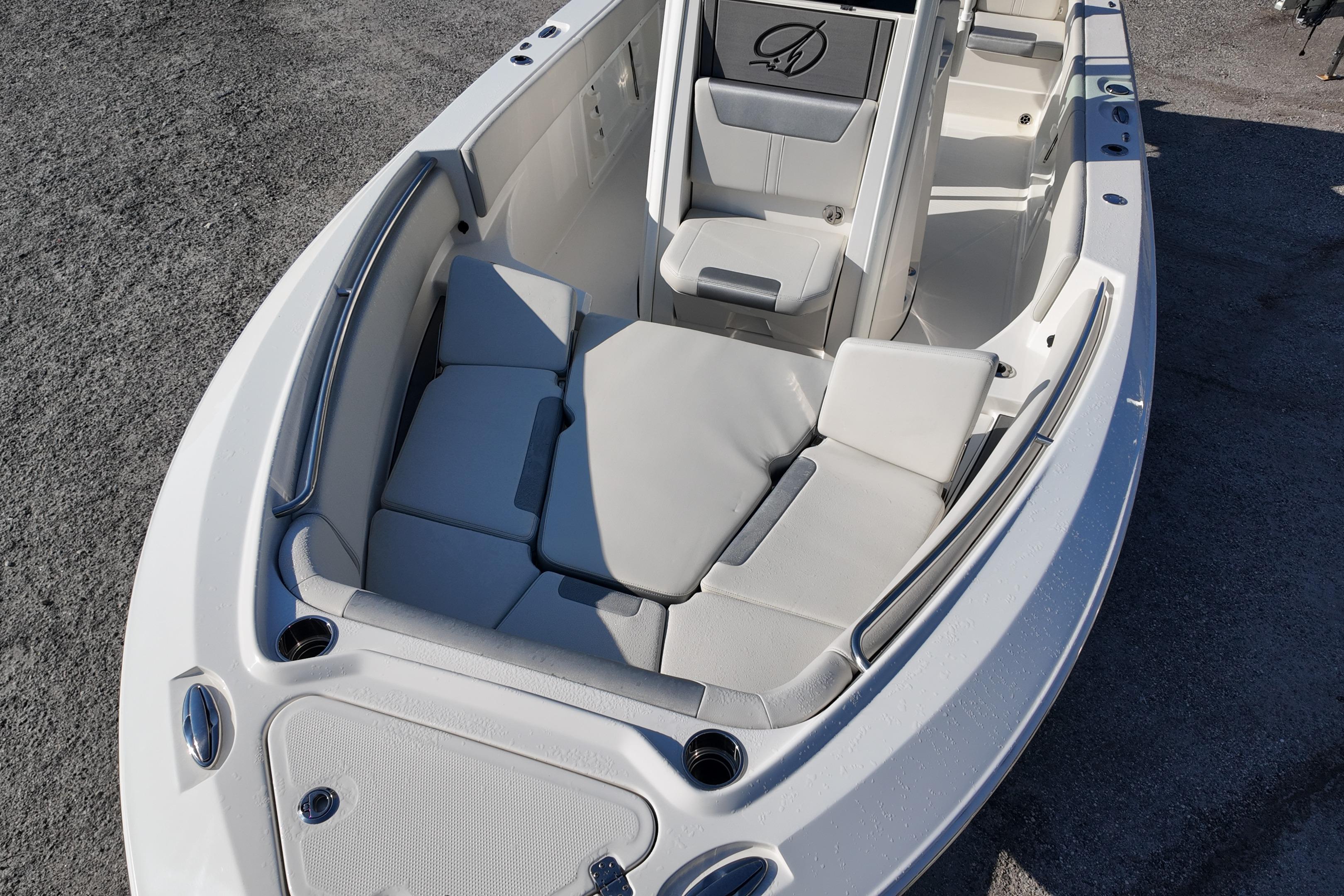 2026 Sailfish 232 CC boat interior with cushioned seating and sleek design.