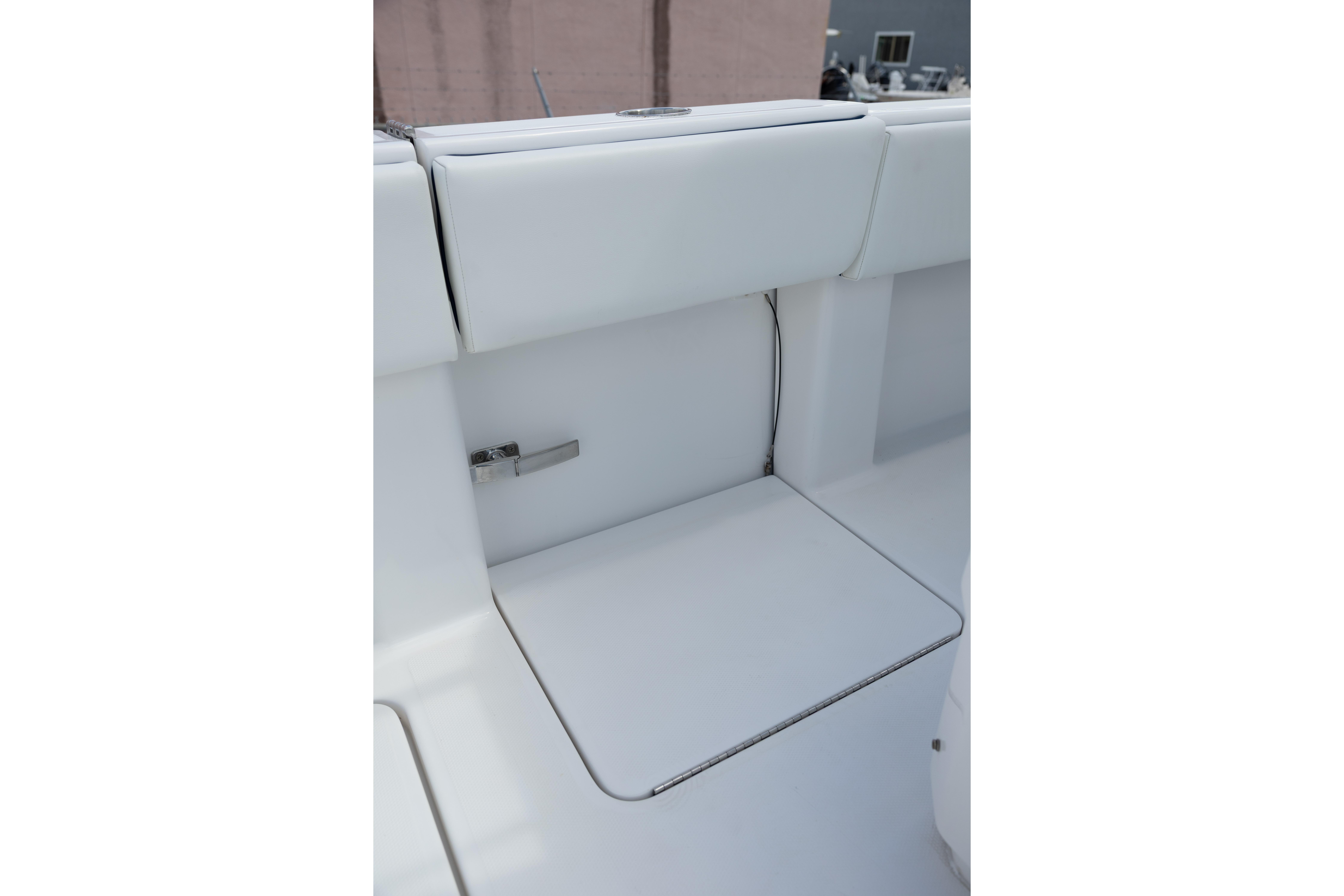 2024 Invincible 39 Open Fisherman boat interior detail with white cushioned seating.
