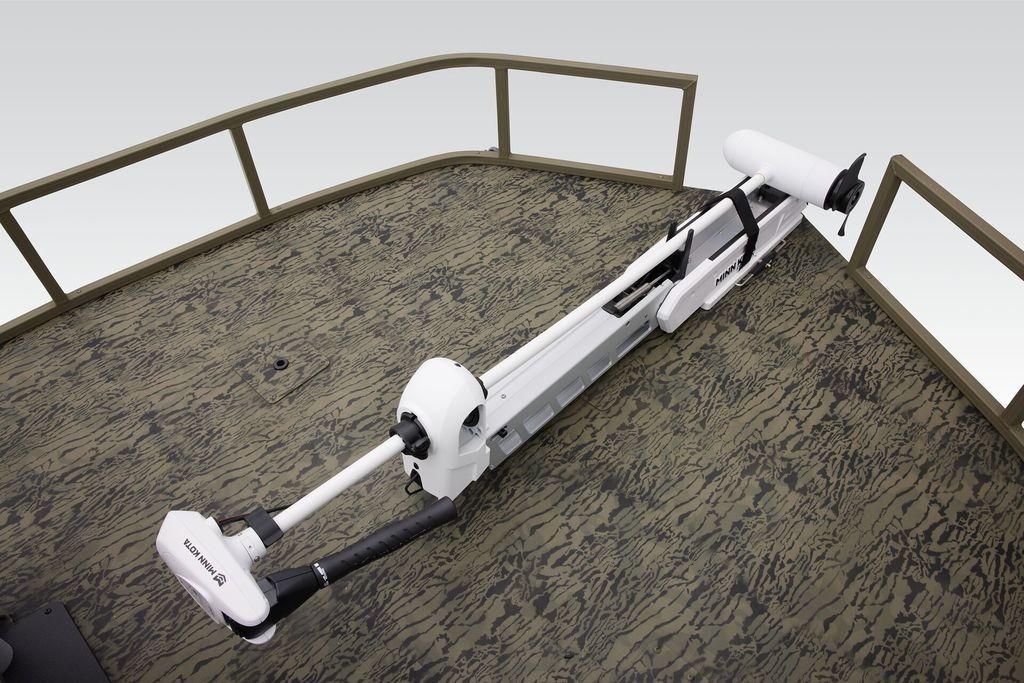 2026 Tracker GRIZZLY® 2072 CC Sportsman boat deck with mounted trolling motor.