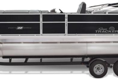 2026 Sun Tracker Party Barge 22 DLX pontoon boat, side view on trailer.