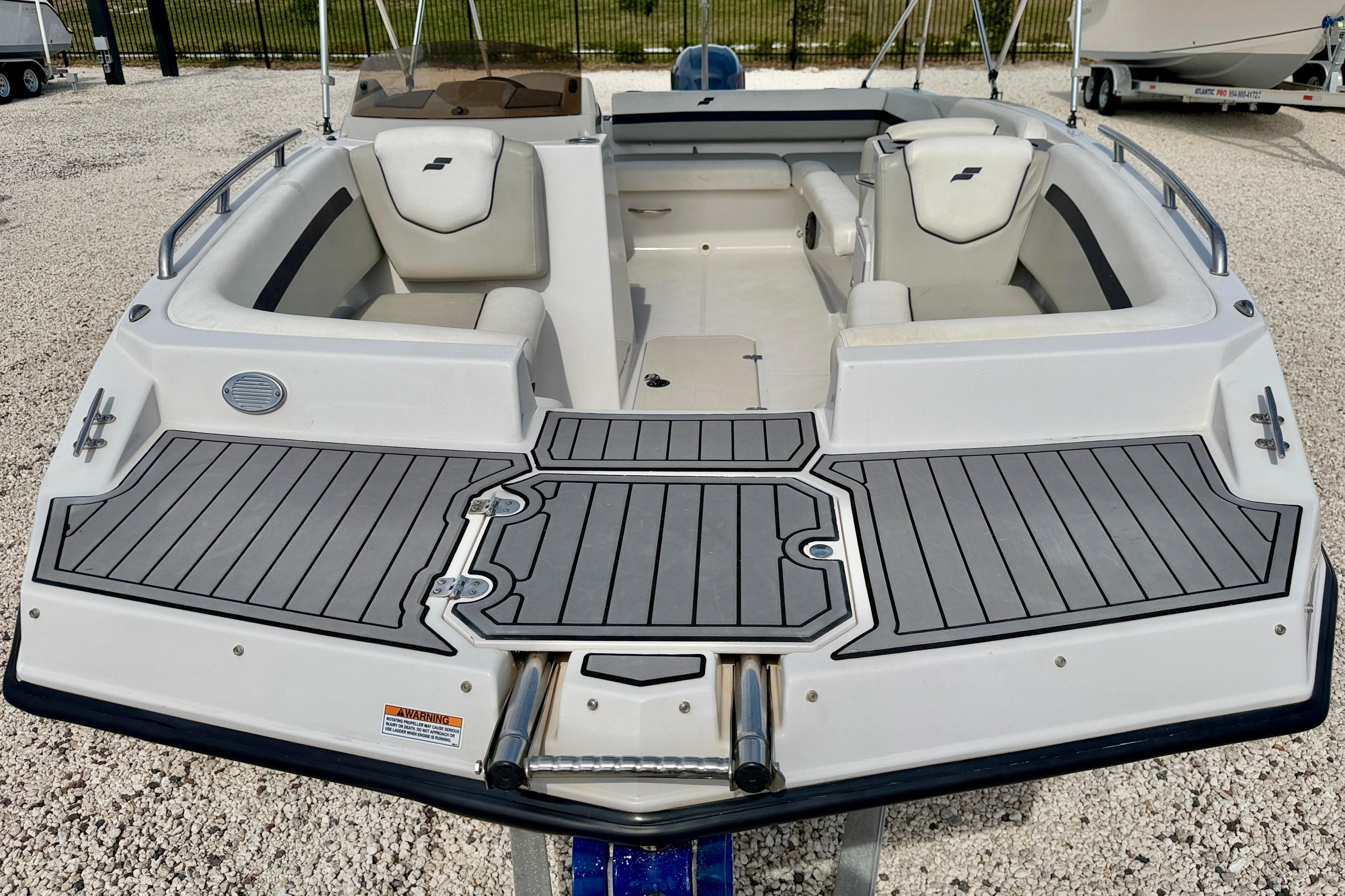 2021 Starcraft SVX 191 OB boat with spacious seating and sleek design.