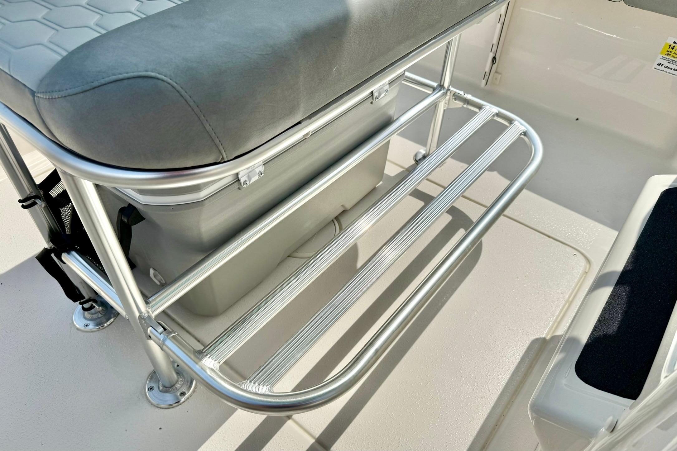 2026 Carolina Skiff 21 Ultra Elite boat seat with aluminum frame and storage.