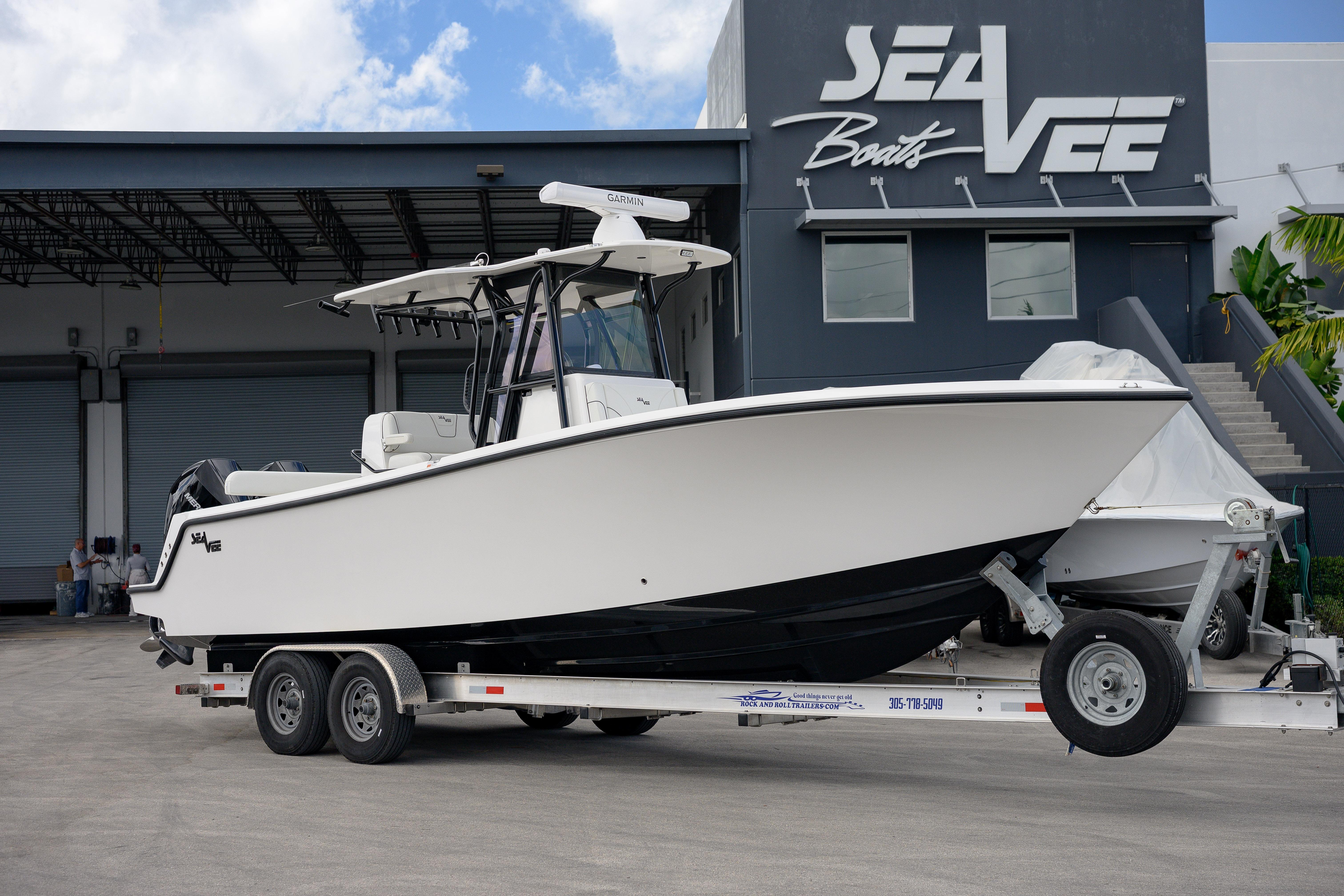2025 SeaVee 290B boat on trailer outside SeaVee Boats facility.