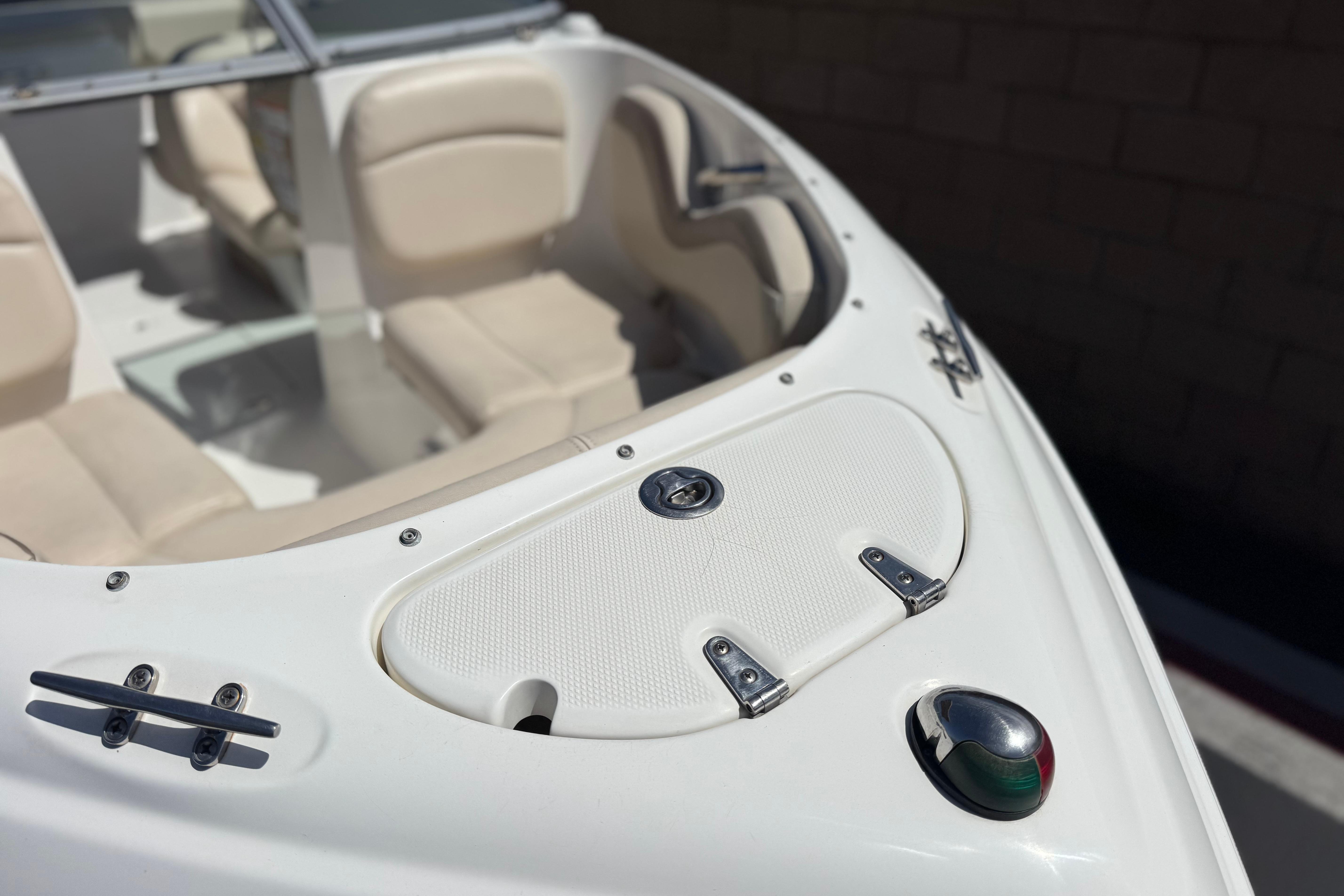 2006 Chaparral 190 SSi boat interior with beige seating and deck details.
