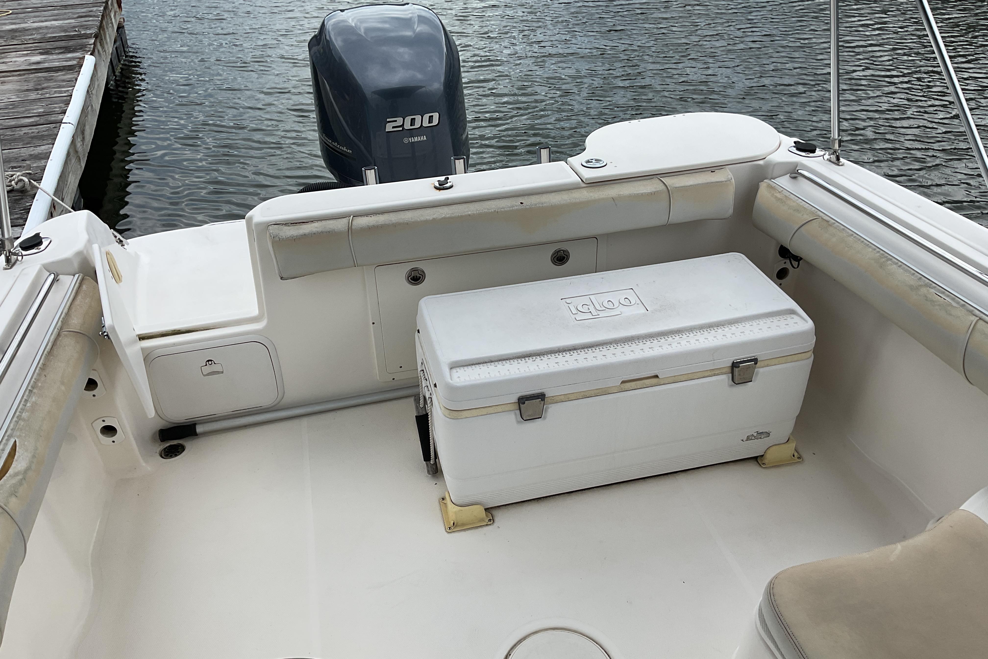 2012 Wellcraft 232 Coastal boat interior with Igloo cooler and Yamaha 200 engine.