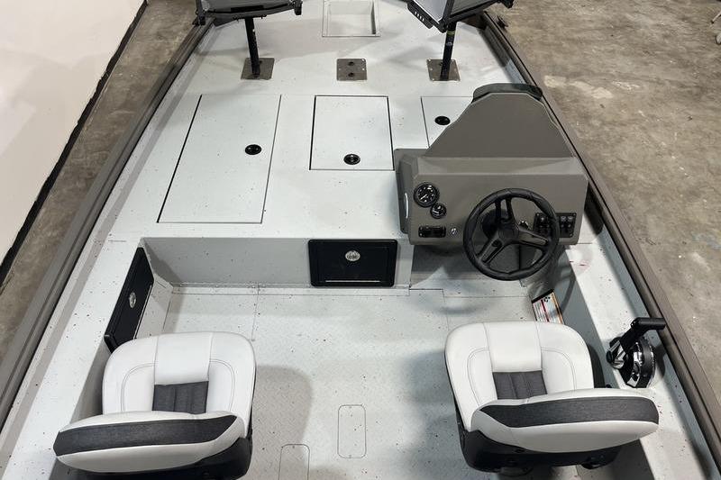 2026 SeaArk Flex 19 Pro boat interior with dual seats and steering console.